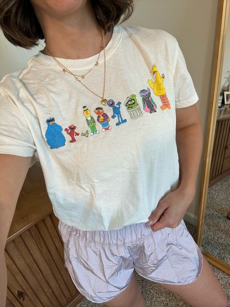 Perfect graphic tee for toddler moms in their Sesame Street era 🤣 the back of the characters are on back of tee! So cute!! Wearing a L

#LTKfamily #LTKfindsunder50 #LTKkids