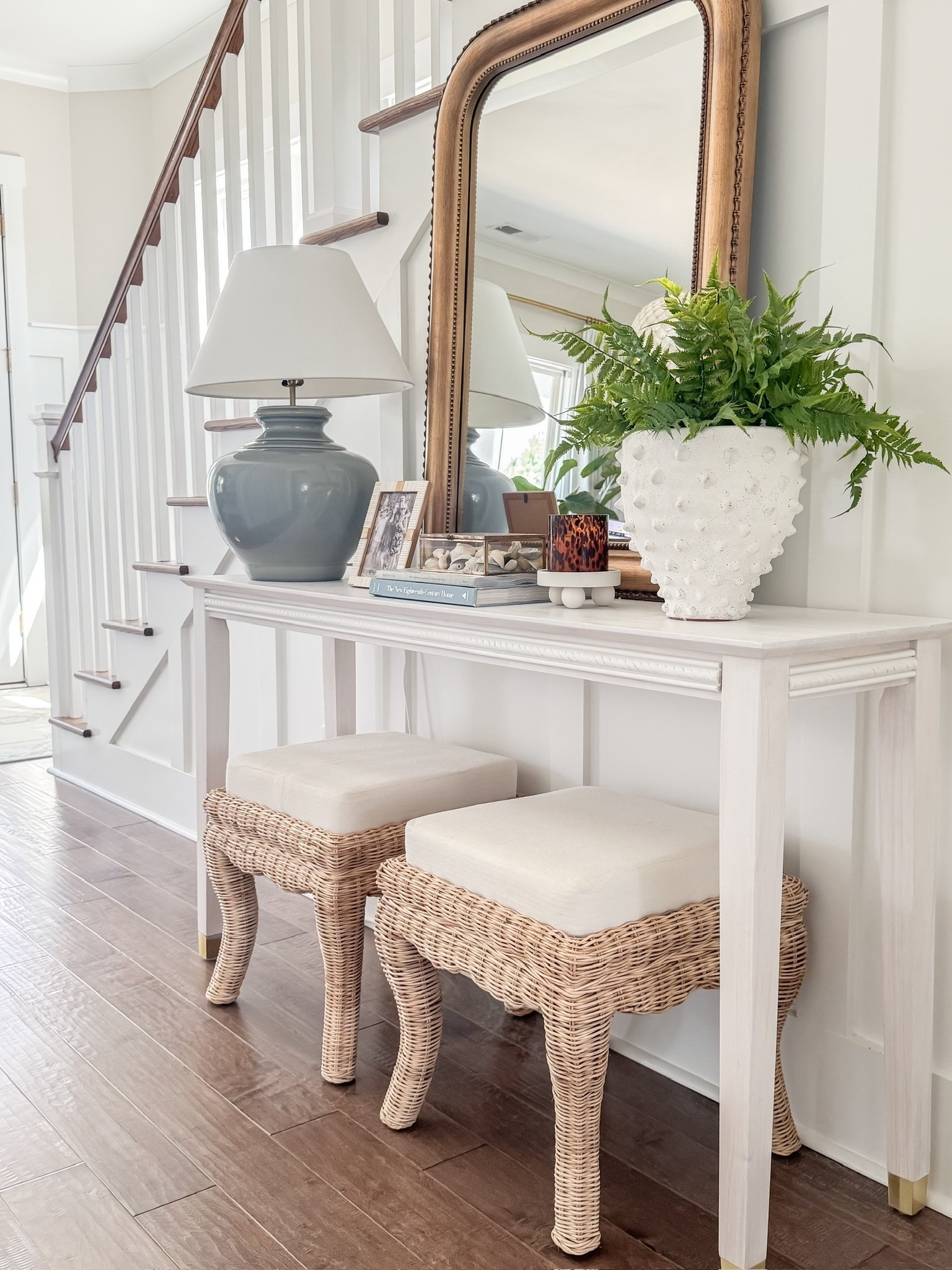 Entryway details ✨ I love mixing high and low pieces, like this Serena and Lily table lamp and Amazon mirror. These rattan stools are always a popular pick! I’m linking a few dupes for the lamp at various price points, as well as some different entryway table options. 

#LTKSaleAlert #LTKHome