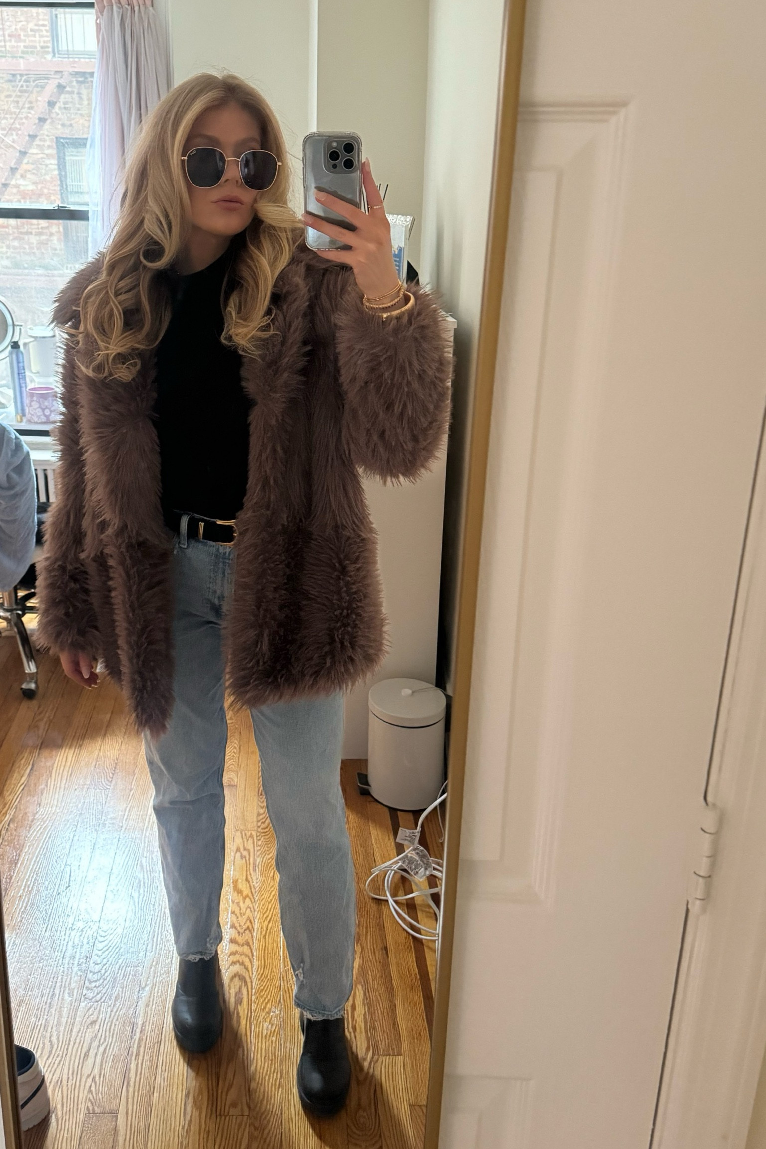 A great winter fit for brunch in the city! I paired my fur coat with a black turtle neck, jeans, and chelsea boots! I accessorized with gold jewelry and Quay sunglasses it’s giving mob wife 

#LTKstyletip #LTKshoecrush #LTKSeasonal