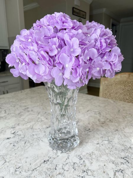 Beautiful glass flower vase looks great with faux flowers or real flowers! These faux hydrangeas come in many colors. This is Lilac. #amazon #amazonhome #founditonamazon #home #hydrangea #flowers #flowervase #fauxflowers #fauxhydrangeas #vase #vases #home

#LTKhome