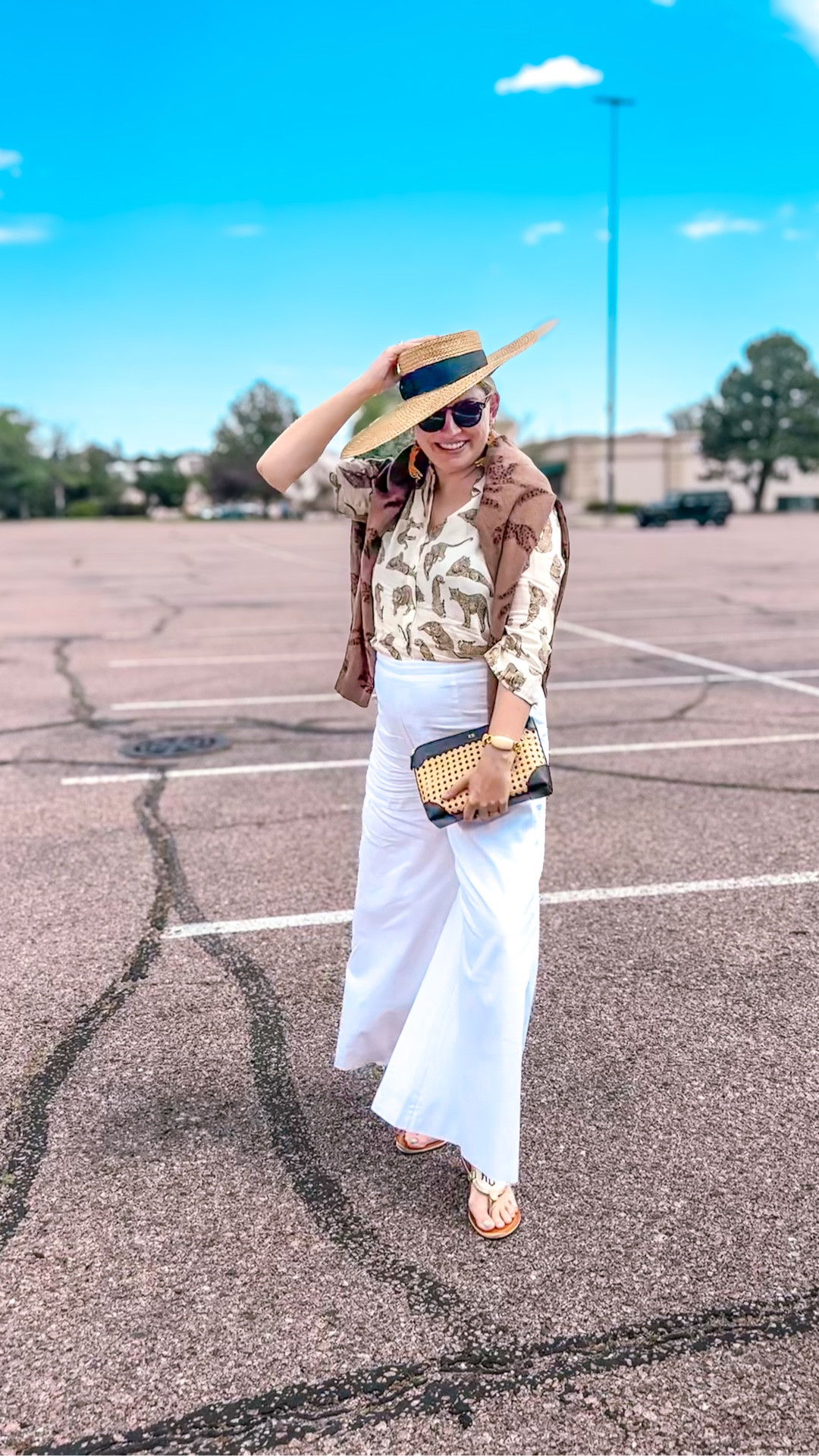 Look 3
Tropical Luxe 🌴 
A Curated Style Series

Fit check time 🐆✨ Today’s shopping look is my favorite type of matchy-matchy: leopard earrings, leopard blouse, leopard sweater.
Still kicking myself that I couldn’t find the leopard boots I’ve been hunting down, but you know that we love an outfit repeat  - so when I finally track them down, this whole look will be making a comeback. 😉

Sometimes style is about being luxe and polished, and sometimes it’s about being playful and a little over the top — that balance is exactly what Tropical Luxe is all about.

Pants - Dillards (linked)
Hat - Eric Javits (linked)
Earrings - Le chic Miami (linked)
Top - L’agence (similar linked)
Sweater - Show Me Your Mumu (linked)
Bag - Mark & Graham (linked)
Sunglasses - Tom Ford (linked)
Shoes - Marleylilly (linked)
Ring - Marleylilly (linked)
Bracelet - J Crew (vintage)
#LAgence #LAgenceStyle #LeChicMiami #DillardsStyle #DillardsFinds #TropicalLuxe #alexmarie #SummerStyle #ShoppingOOTD #MaximalistStyle #FitCheck #OOTDInspo