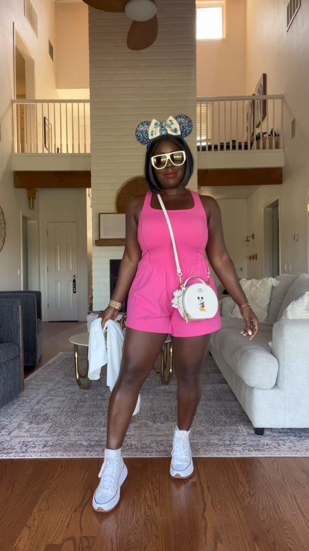 Amazon is where it’s at for Disney park athleisure!! Love this romper for walking around all day. Super comfy and cute! Styled it with high top chucks, Mickey bag, Mickey ear headband, Free People sunglasses and white Amazon windbreaker. 

#LTKstyletip #LTKfitness #LTKVideo