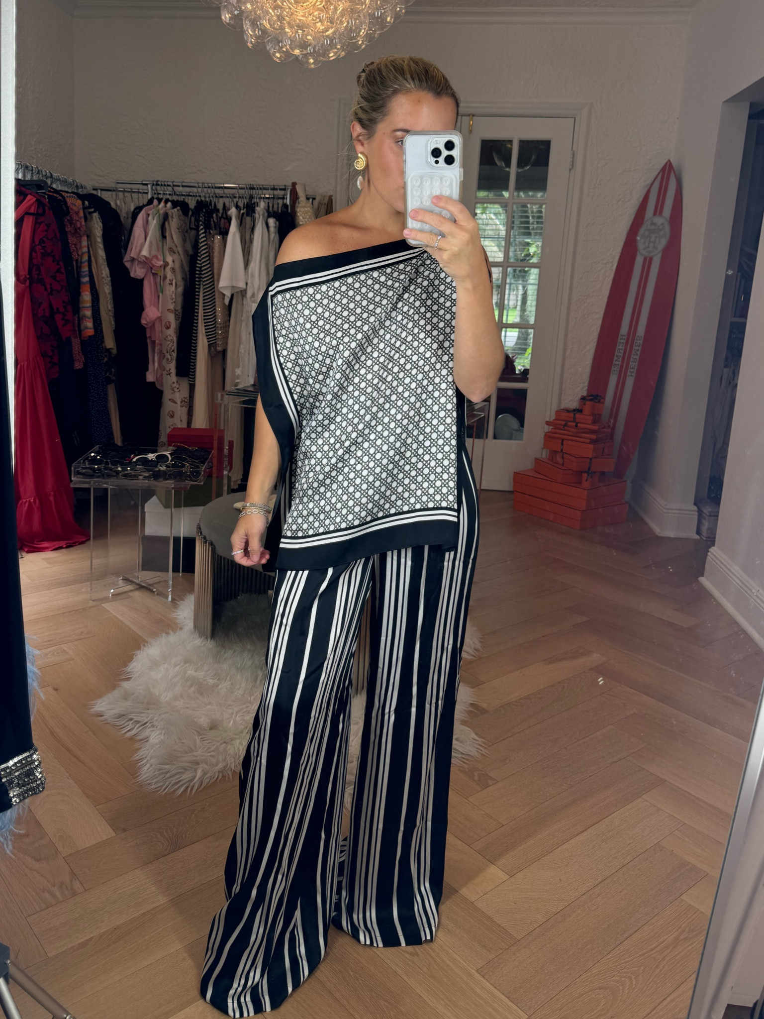 A chic evening outfit idea! Perfect as an European summer outfit idea, beach trip outfit idea, date night outfit, or event outfit idea. 

Black and white striped pants, black and white top, neutral outfit, quiet luxury outfit idea 

#LTKWorkwear #LTKParties #LTKStyleTip