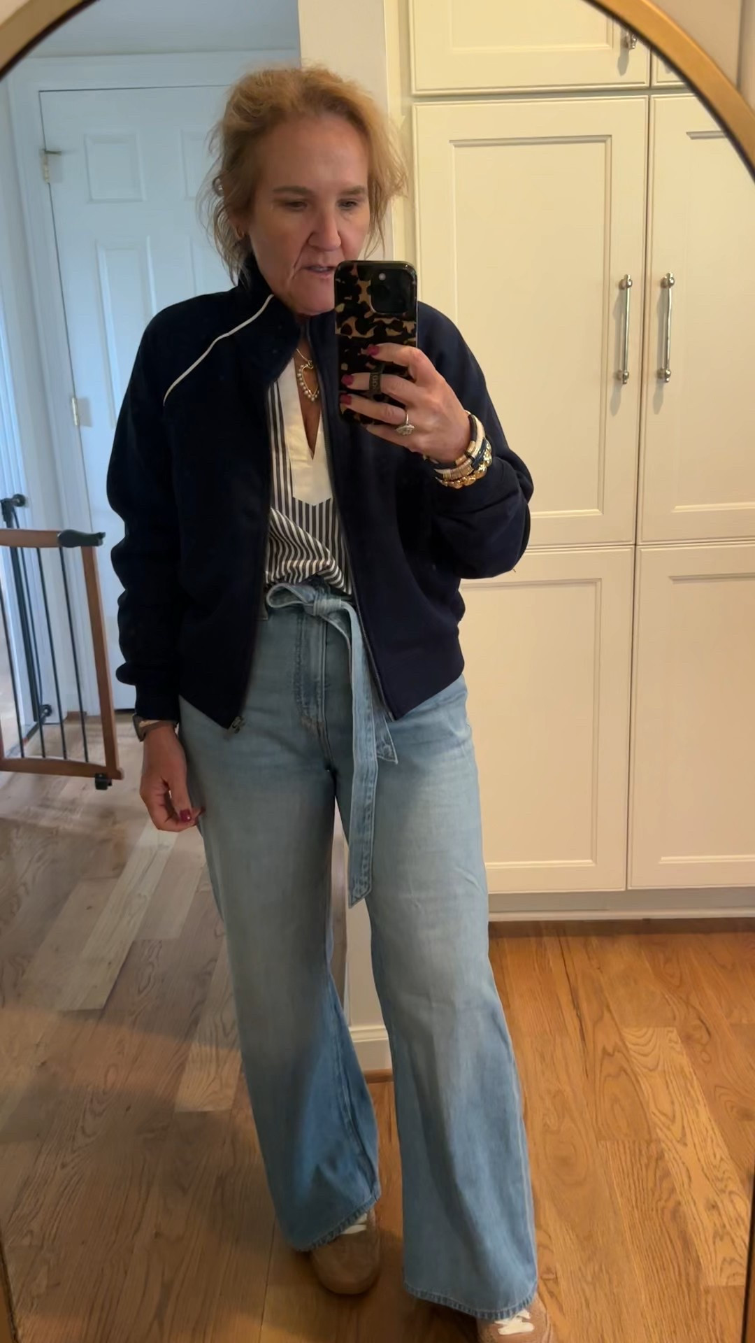 Loft palazzo jeans size 29 petite 
Spanx pique air essentials jacket size medium 
Loft top size small 
Dolce vita sneakers true to size 
Wearing the 14” liv chain with my gold pearl heart charm. Love this combo! 

#LTKWatchNow #LTKOver40 #LTKSaleAlert