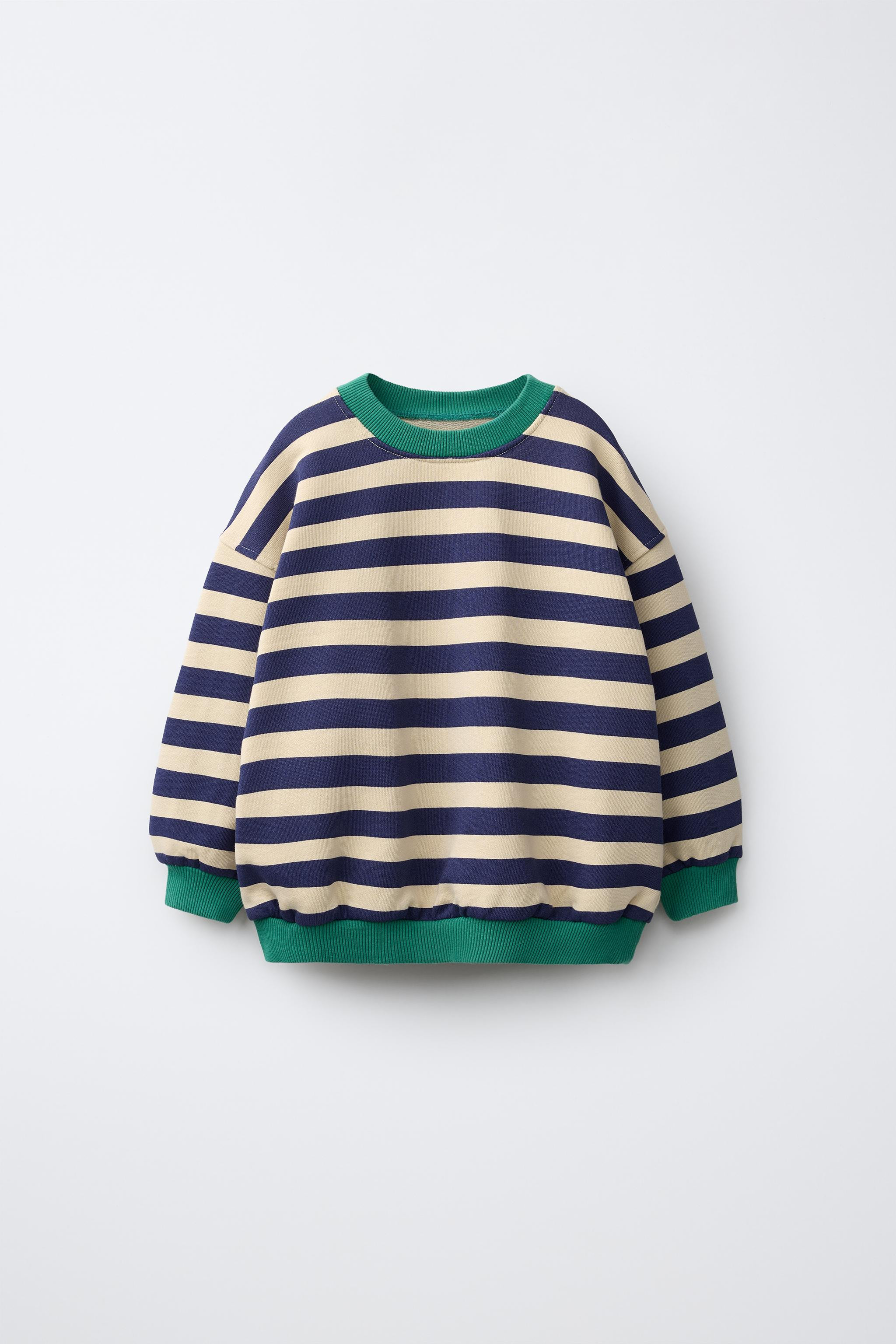 Round neck sweatshirt with long sleeves and contrasting ribbed trim. Striped print. | Zara US