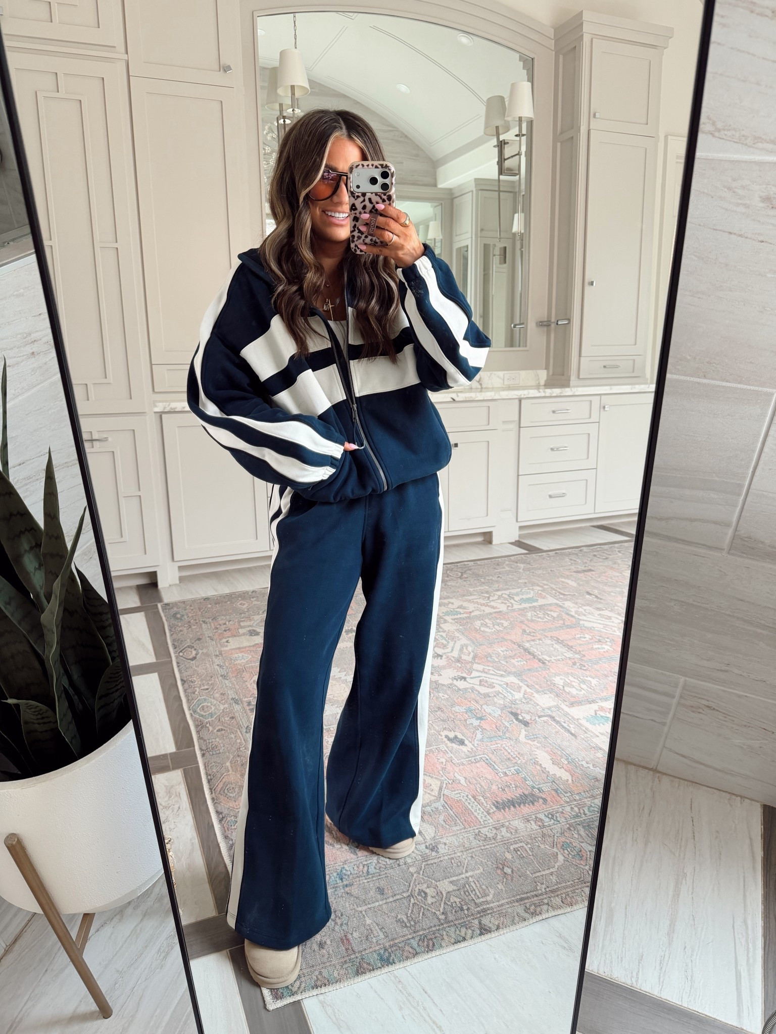 The cutest matching track set! Runs very oversized. I’m wearing an extra small in the bottom and a small in the top!

#LTKSeasonal #LTKootd #LTKmomlife