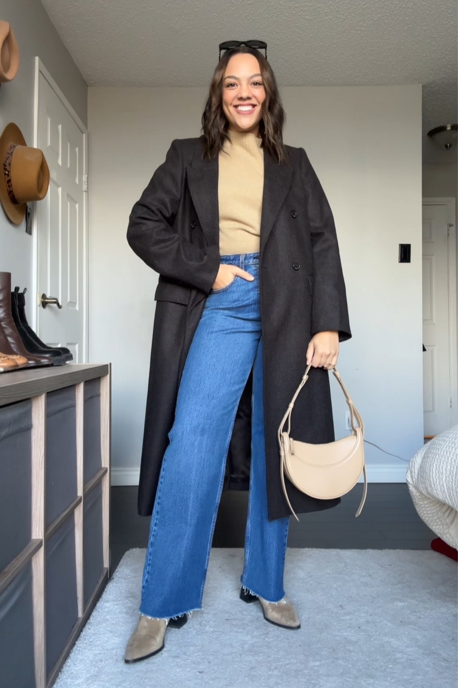 A winter outfit you can try!
-Long brown structured coat from Aritzia, I have a large. 
-Tan mock neck merino wool sweater from Everlane, I have a medium. 
-90s relaxed jeans in a medium wash from Abercrombie, I have a size 29 long. 
-Suede ankle boots, similar linked. 
-Polene Paris numero dix bag in beige. 
-Celine Triomphe 52mm sunglasses in black acetate. 


#LTKstyletip #LTKfindsunder100 #LTKSeasonal