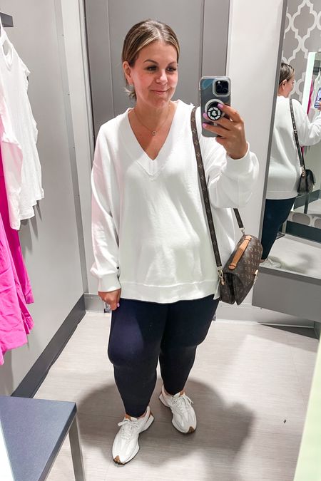 One of my most worn, absolute favorite outfits and it’s on sale at Aerie! These lightweight sweatshirts are perfect for chilly mornings and cover your booty, and the leggings are beyond soft and SO stretchy! This is a staple mom outfit/school drop off outfit for me. Wearing L in sweatshirt, XL in leggings. 

#LTKfindsunder50 #LTKplussize #LTKsalealert