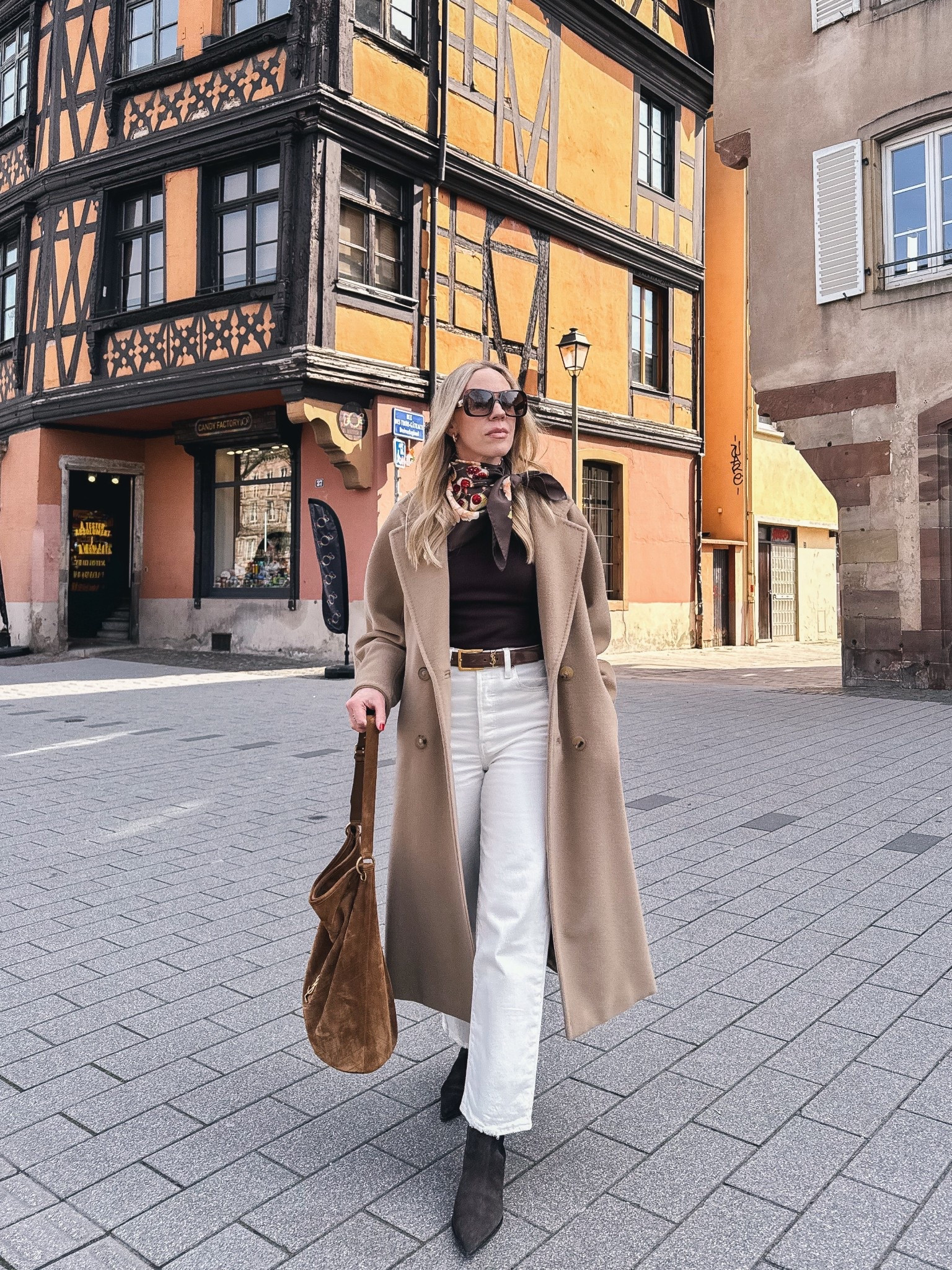 Spring outfit, camel coat, silk scarf outfit, white jeans, YSL suede bucket bag, European vacation outfit 

#LTKOver40 #LTKTravel #LTKSaleAlert