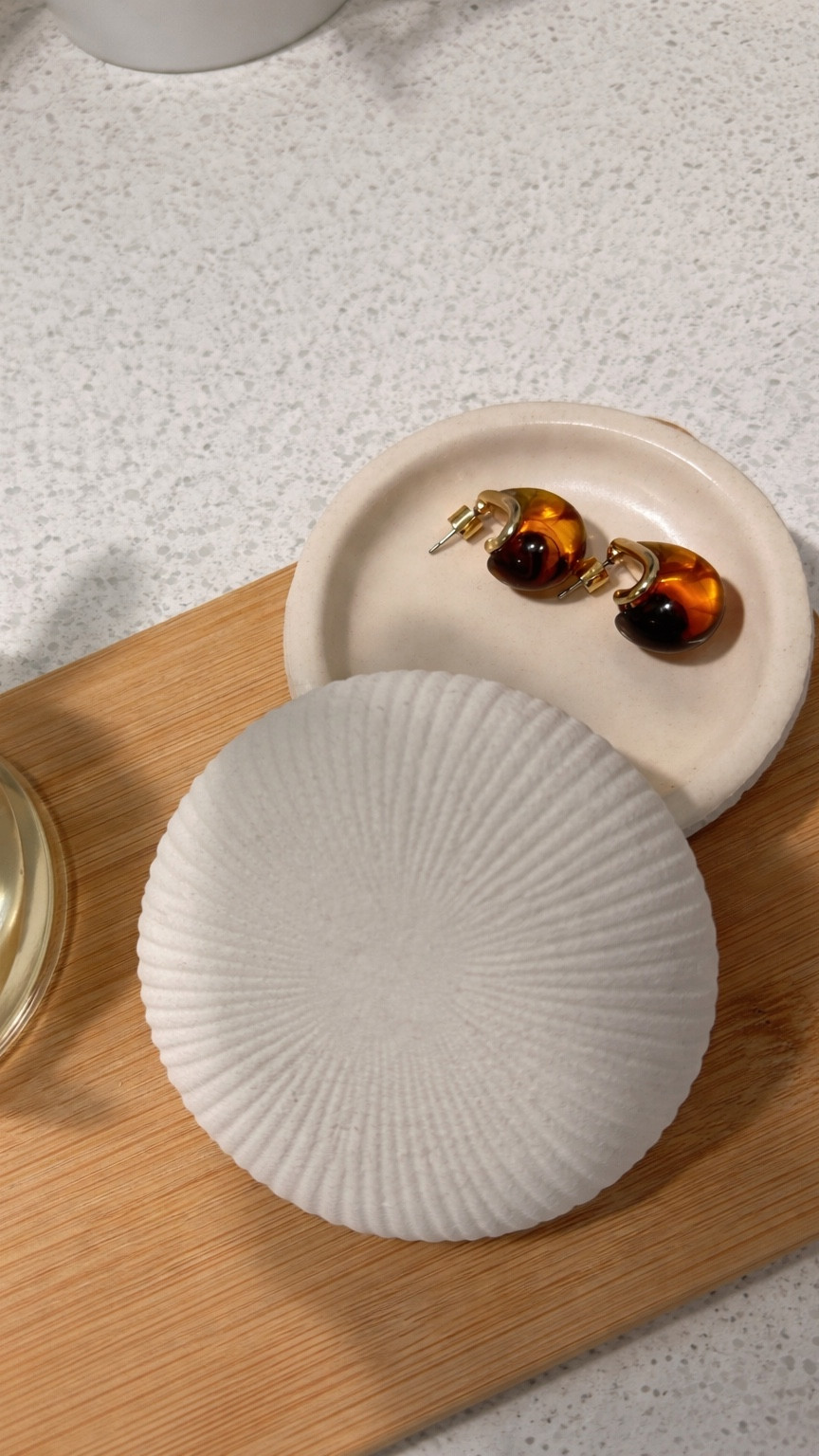 how cute are these resin earrings? i just couldn’t leave them at the store. obsessed with this $10 stone dish too.