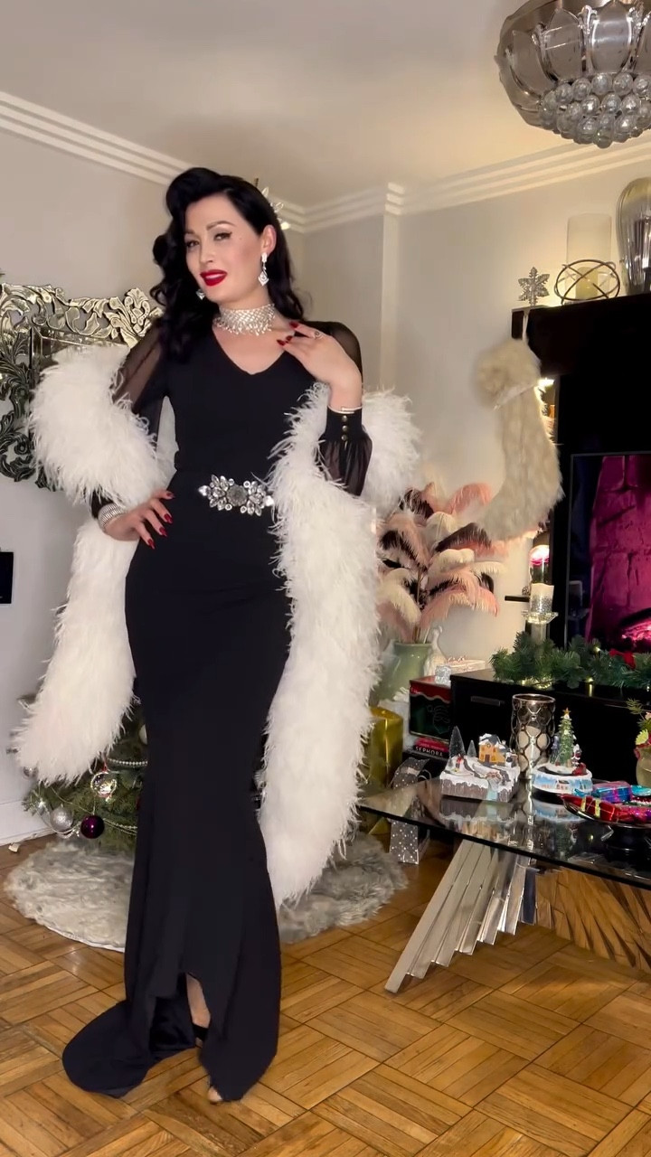 Who said black can’t be festive?
Add a touch of red, a flicker of sparkle, a whisper of feathers — and suddenly it becomes the perfect look for any holiday soirée.

Comment “SHOP” for a link to this outfit, my darlings.

Lately, I’ve had this quiet feeling that something was shifting — almost like standing on the edge of a doorway waiting to open. And then, as if on cue, the most extraordinary message arrived. I can’t reveal the surprise just yet, but it’s something I am deeply honored by… and so excited to share with you soon. ✨

It’s always in the moments when you start to wonder if all your effort has gone unseen that life finds a way to remind you otherwise. Tenacity has always been one of my greatest strengths — that unwavering belief in what my heart is meant for, even when the path isn’t always clear.

This year is ending in the most magical, unexpected way, and I feel profoundly grateful.

Stay fabulous, stay resilient, and always strive to become the most magnificent version of yourself, my darlings. The universe has a way of surprising you when you least expect it.

Dress @british_retro 
Heels @christianlouboutin 
Bag @dior 
Boa @fancyfeathercom 
Jewelry vintage
Makeup @diorbeauty @yslbeauty @valentino.beauty 

#HolidayStyle #EveningWear #grwm #QuietLuxuryLook #ModelLife
