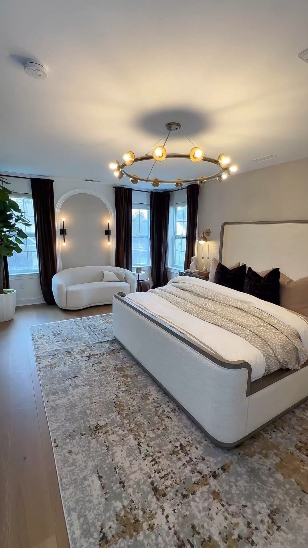 Throwback to one of my favorite makeover projects this year!  Imagine after a long week, stepping into this relaxing haven of a bedroom ☺️. It’s the perfect retreat to unwind and can we talk about how much bigger it looks now? 🤩 What’s your favorite element in this space? For me, it’s got to be the cozy bed, that inviting sitting area, and the stunning arch design behind it! 👌🏾



#beforeandafter #bedroommakeover #interiordesign

#LTKSaleAlert #LTKHome