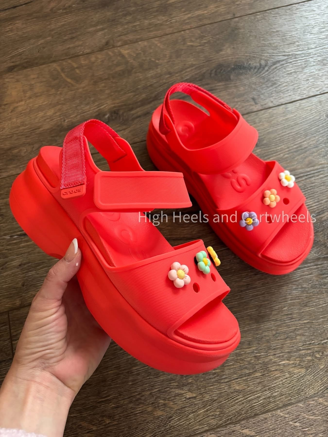 Actually in LOVE with these trending Crocs! They come in a variety of colors. I added some charms to make them extra cute. Adjustable straps and very comfy!