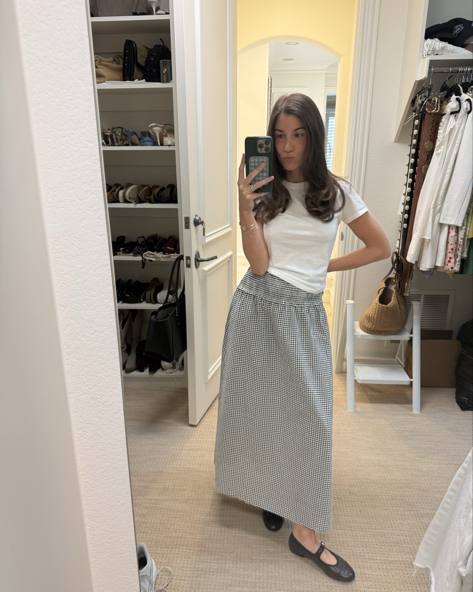 A new go-to skirt. Comes in multiple colors and prints, SO lightweight, and the smocked waist is a dream! Love the details on this jacket, and this is one of my favorite white tees. This would be so good for pregnancy / PP too #ootd #outfitinspo #everydaystyle 

#LTKgrwm #LTKSeasonal #LTKootd