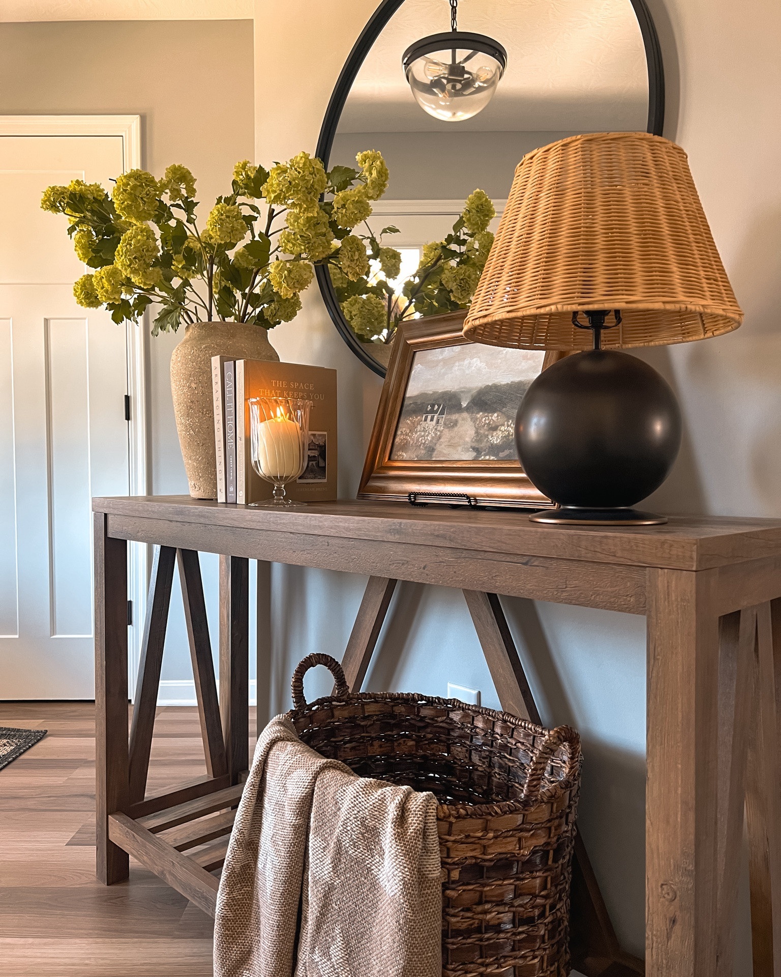 Swapped out the gingham lamp shade for this wicker one & I’m loving the look! Proof that even the littlest swap can change the whole vibe! Swipe to see the before look & tell me which one you like better!

Entryway | Console Styling | Spring Decor | Summer Decor | Table Styling | Table Lamp | Target Finds

#LTKHome #LTKSeasonal