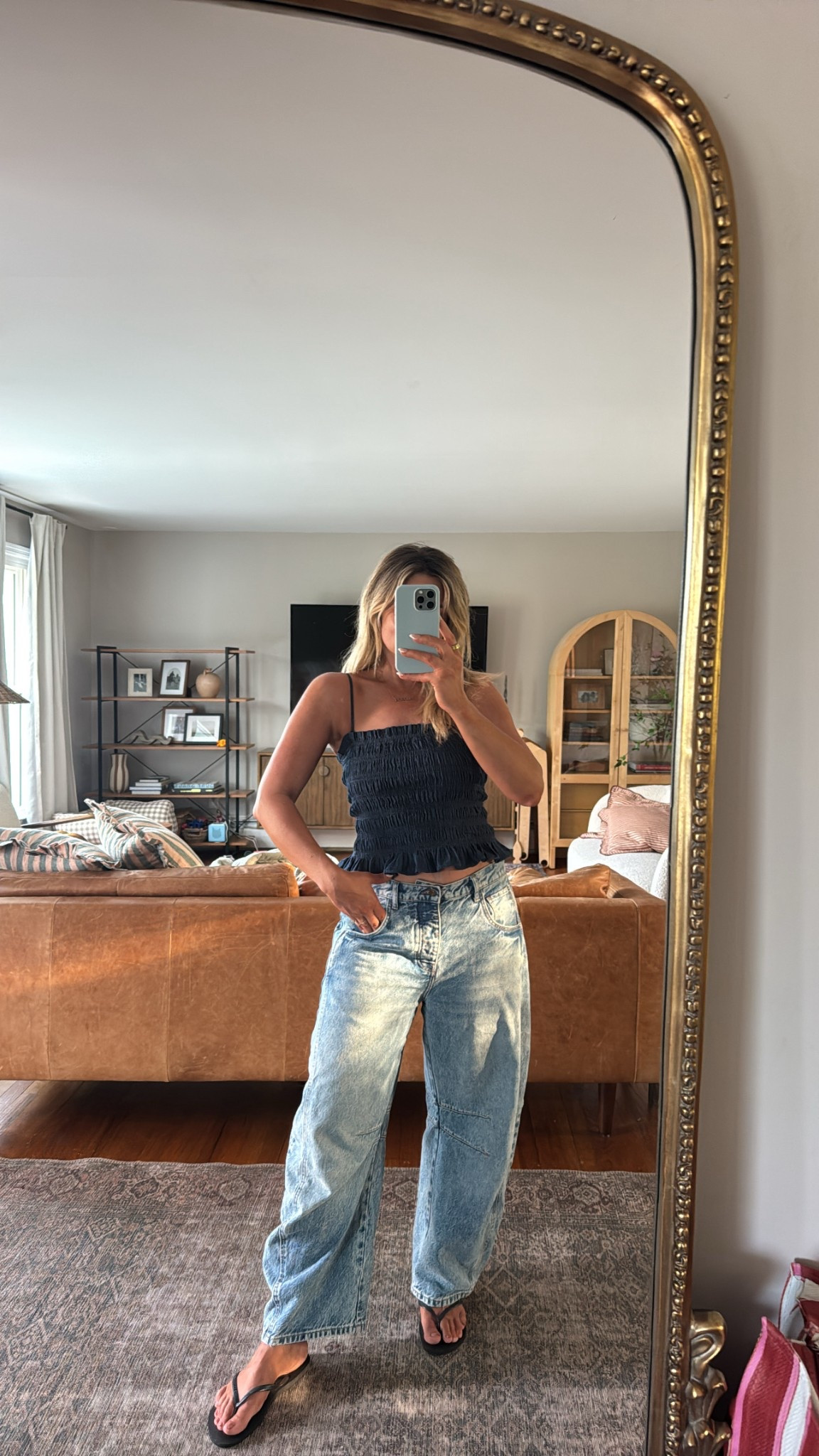 Size up one in jeans ( usually 28 and wearing 29 )

Smocked top is a size small and so flattering. Obsessed

