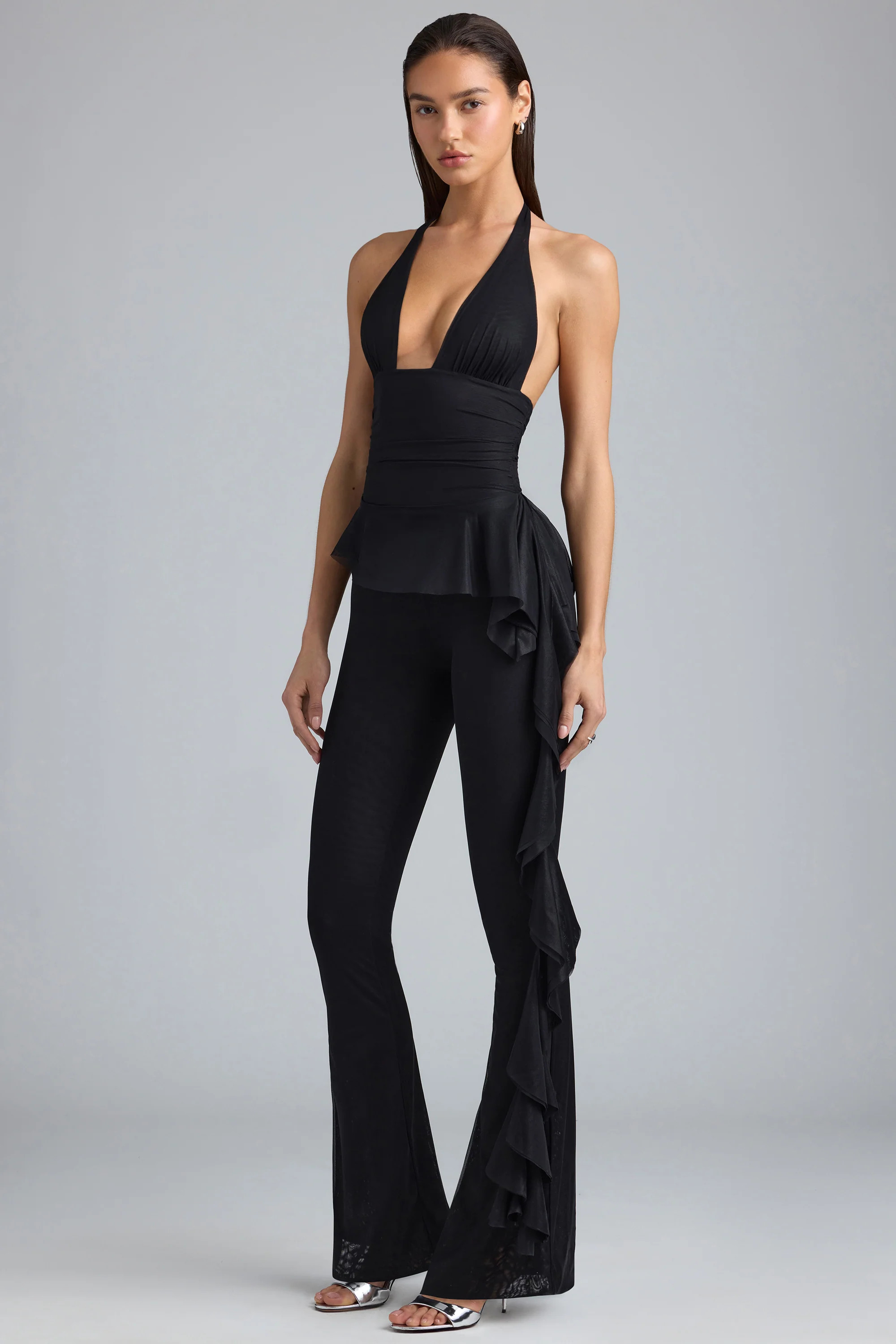 Metallic Ruffle Low-Rise Flared Trousers in Black | Oh Polly