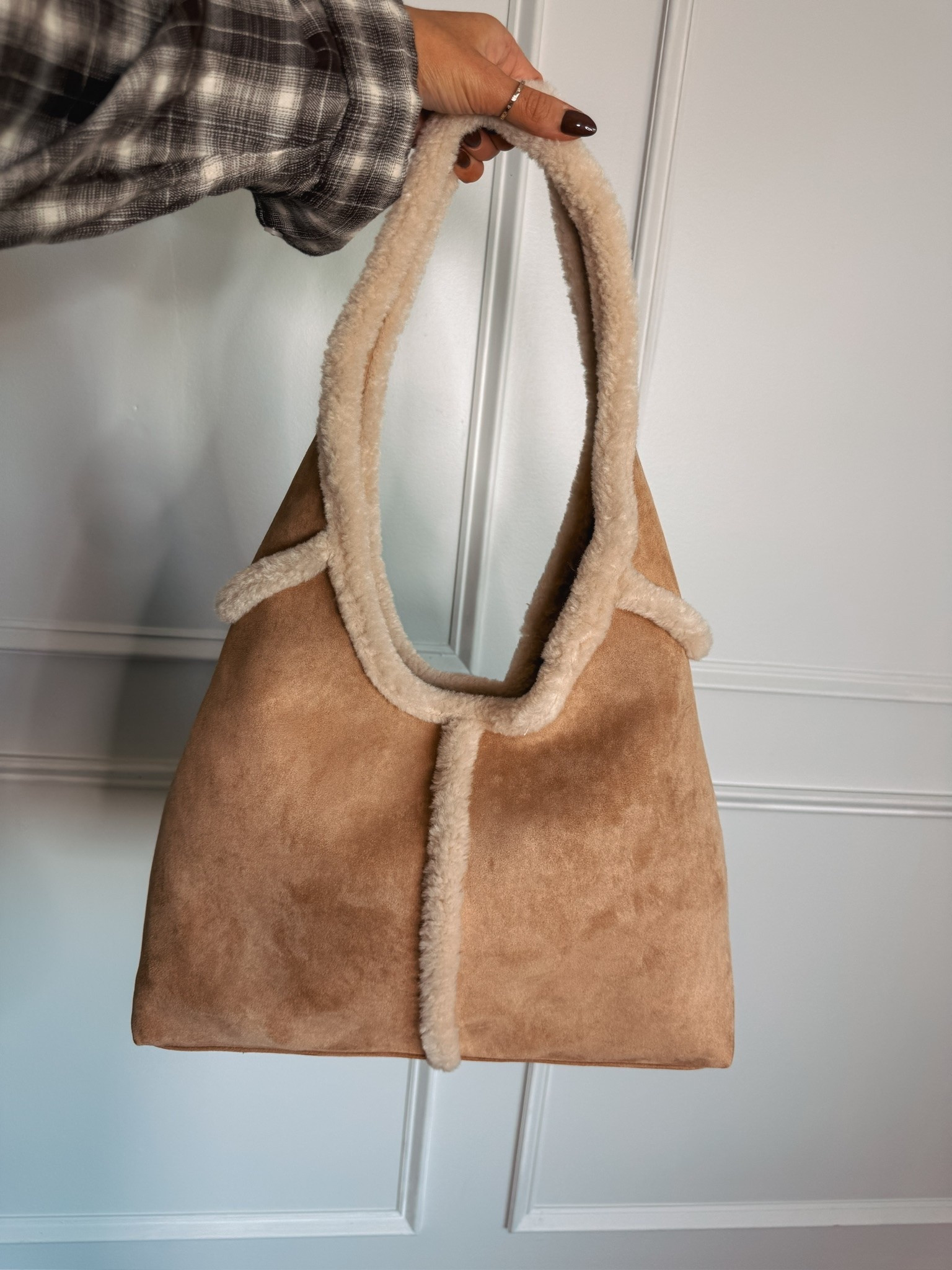 I will be wearing this bag all fall and winter! The shearling details are beautiful! It’s the perfect size  to fit all my mom necessities!