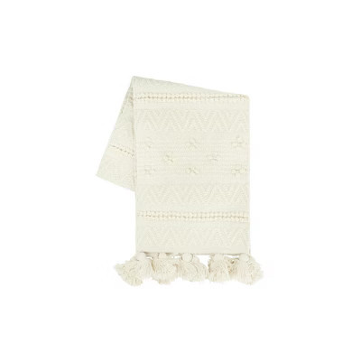 Storied Home 72" Woven Cotton Textured Table Runner with Pom Poms & Tassels | Target