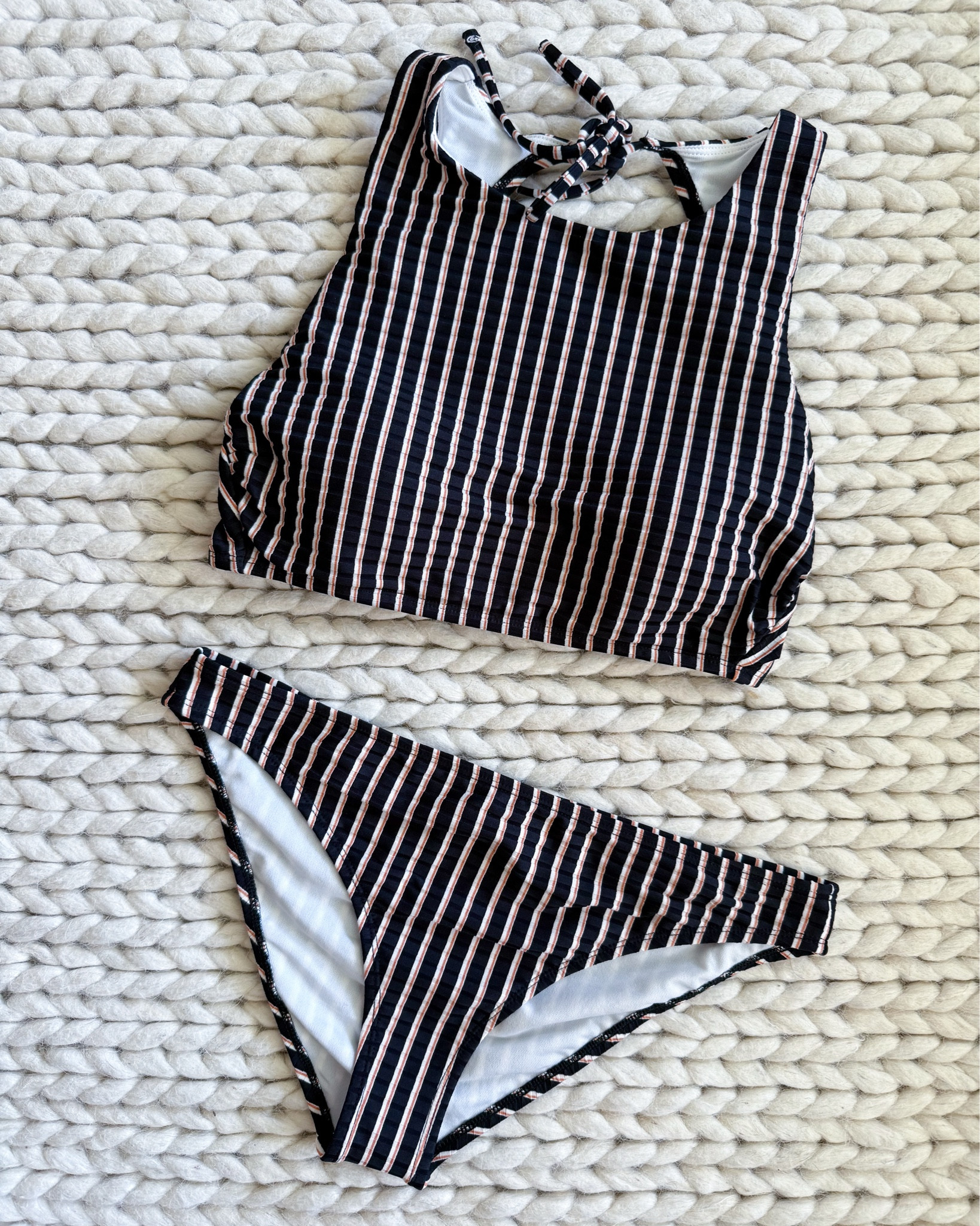 Neutral swim goals. This Target bikini is giving classy without trying too hard. Love the high neck & full coverage + it’s actually flattering and still feels stylish. The ribbed stripe detail makes it look way more expensive than it is, & it’s super comfy too. All Target swimsuits are 30% off this week so don’t sleep on this one. I got size small in both pieces.

target swimsuit sale – ribbed bikini set – neutral bathing suit – high neck swimsuit – affordable swimwear – flattering two piece – modest swimsuit style – striped bikini top – chic beachwear – summer vacation outfit – target style finds – best swimwear deals – cute target bikinis – fashion on a budget – trendy swimwear looks


#LTKSaleAlert #LTKSummerEdit #LTKSwim
