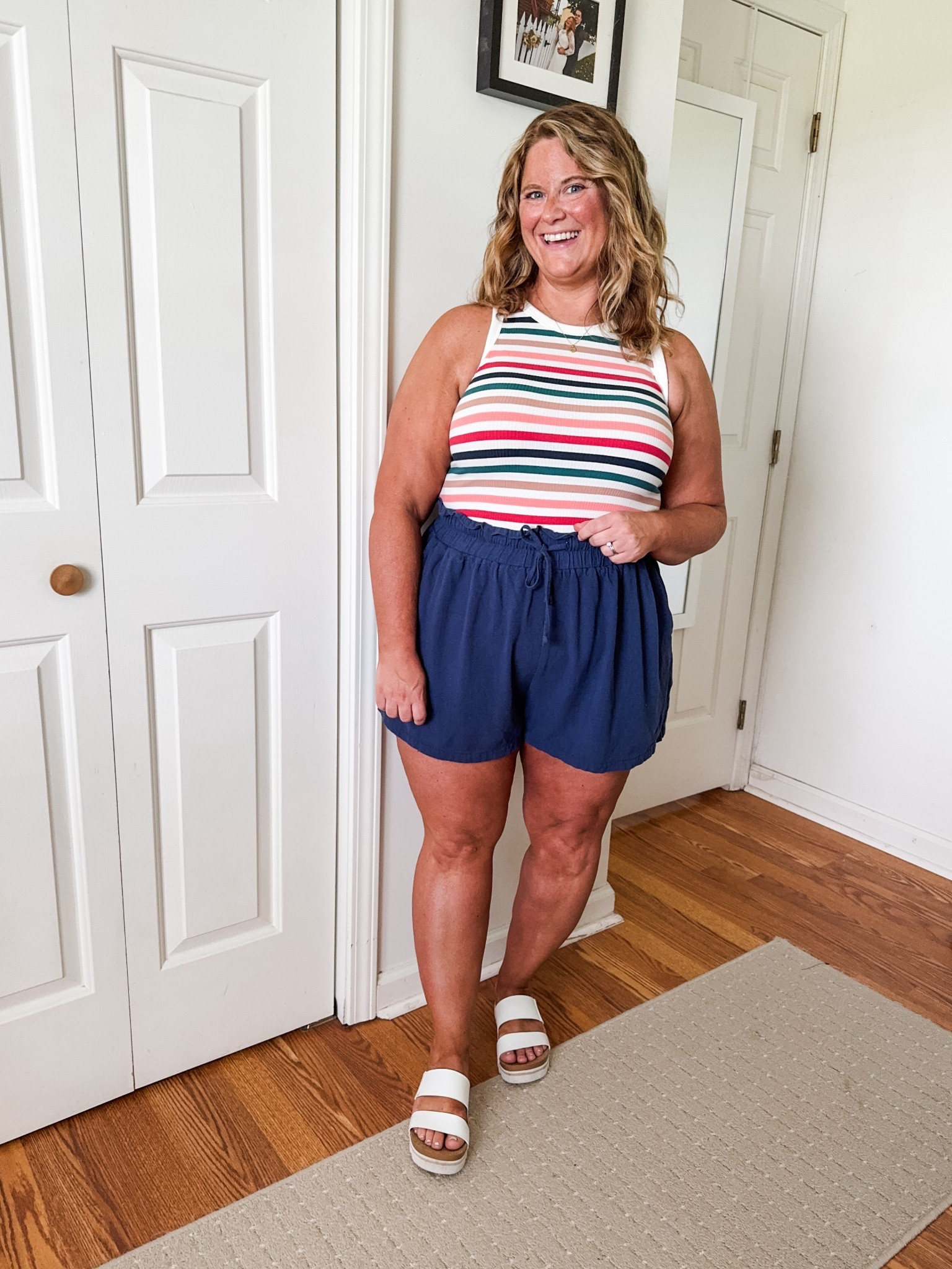 This tank is the cutest! I’m wearing a large.  Wearing an XXL in shorts (I sized up)  

#LTKMidsize #LTKFindsUnder50 #LTKSeasonal