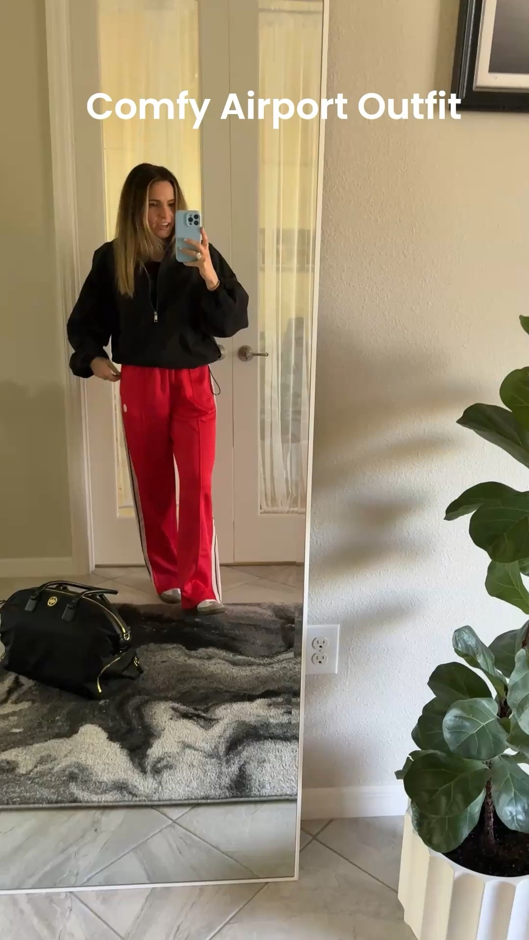 If you have a 6-hour flight coming up, this is your sign to get these track pants✈️ I’ve also been living in this funnel neck windbreaker jacke it’s my new favorite airport outfit.
The jacket is so lightweight but still keeps the chill away on the plane — and if you’ve been wondering how to style a funnel neck jacket, this is it. Casual, elevated, and actually chic. The red striped track pants are so comfy and stretchy but look intentional — not like you rolled out of bed (even if you did 😂).
This is the kind of travel outfit airport style that makes you feel put together without sacrificing comfort. Chic airport style doesn’t have to be uncomfortable and this outfit is proof. 

#LTKTravel #LTKootd #LTKgrwm