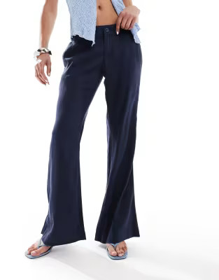 Hollister low rise linen tailored baggy flare trousers in navy | ASOS | ASOS (Global)