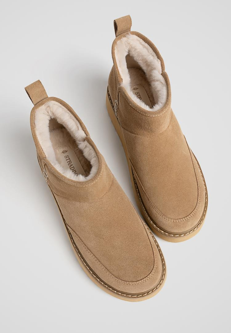 Bottines en fourrure et cuir | Stradivarius (FR)