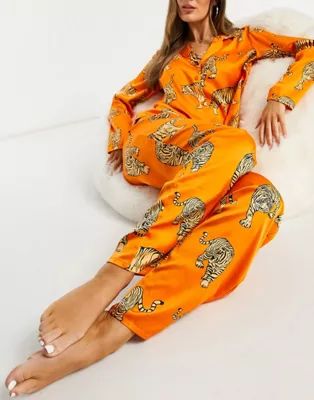 Chelsea Peers satin revere top and long trouser pyjama set in orange tiger print | ASOS (Global)
