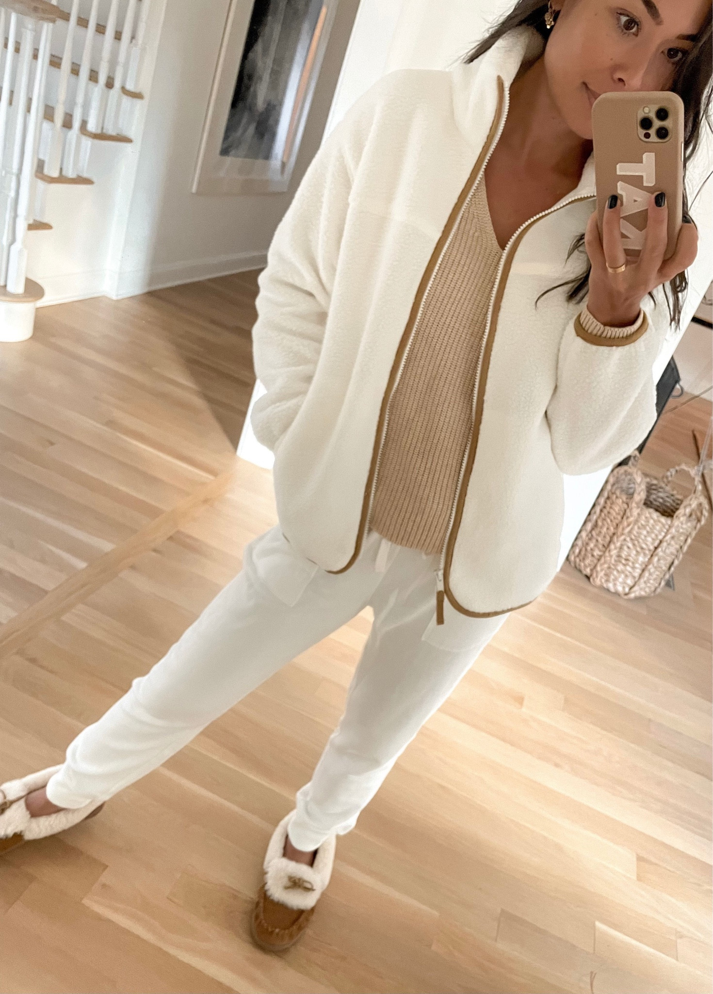 Kat Jamieson of With Love From Kat wears a fall outfit. Neutral jacket, white sweatpants, fall slippers, neutral sweater, fall style. 

#LTKSeasonal