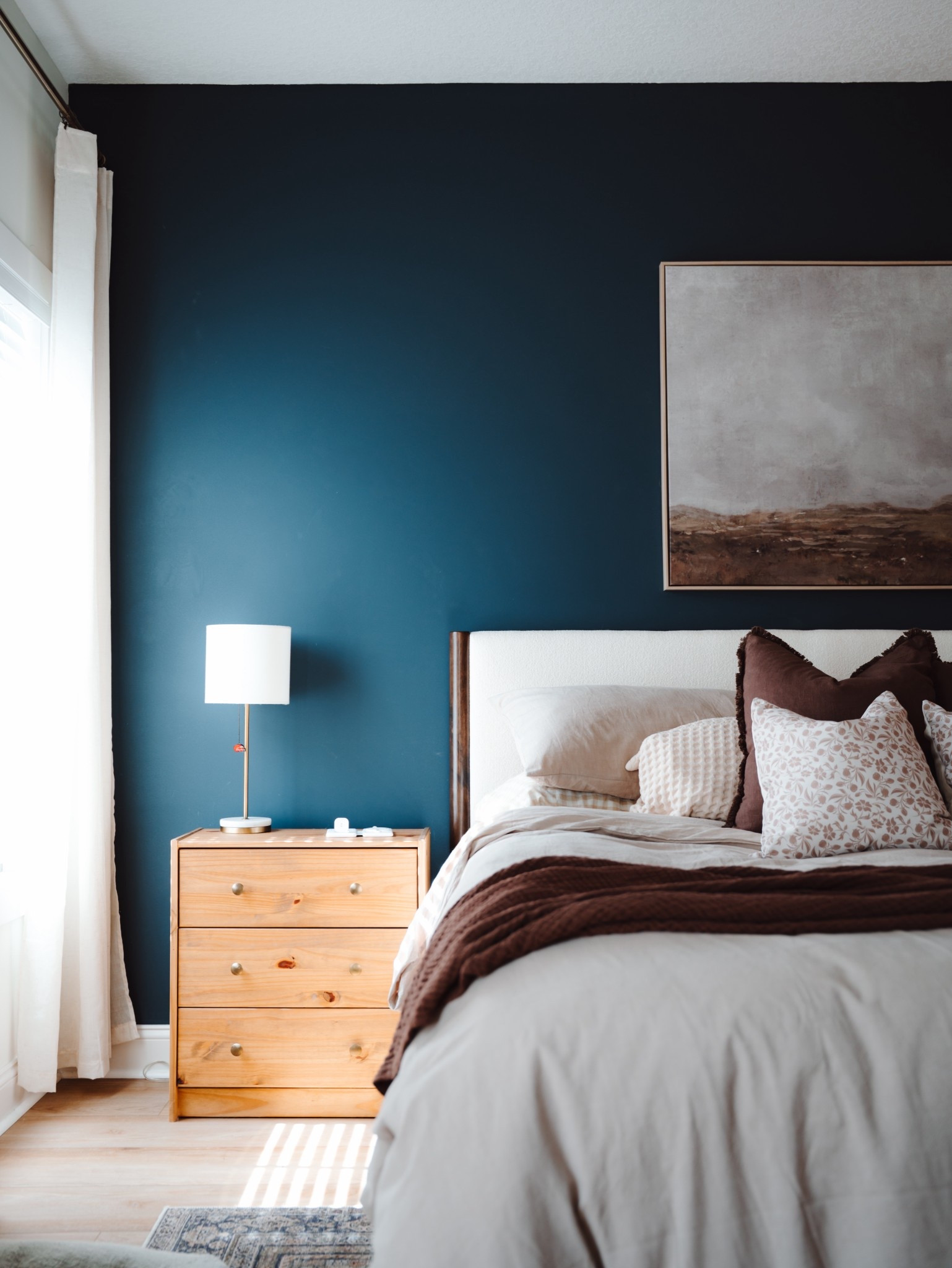Recently did a bedroom refresh and lovvvvveeee the moody browns and blues #bedframe #boucle #moodybedroom

#LTKHome
