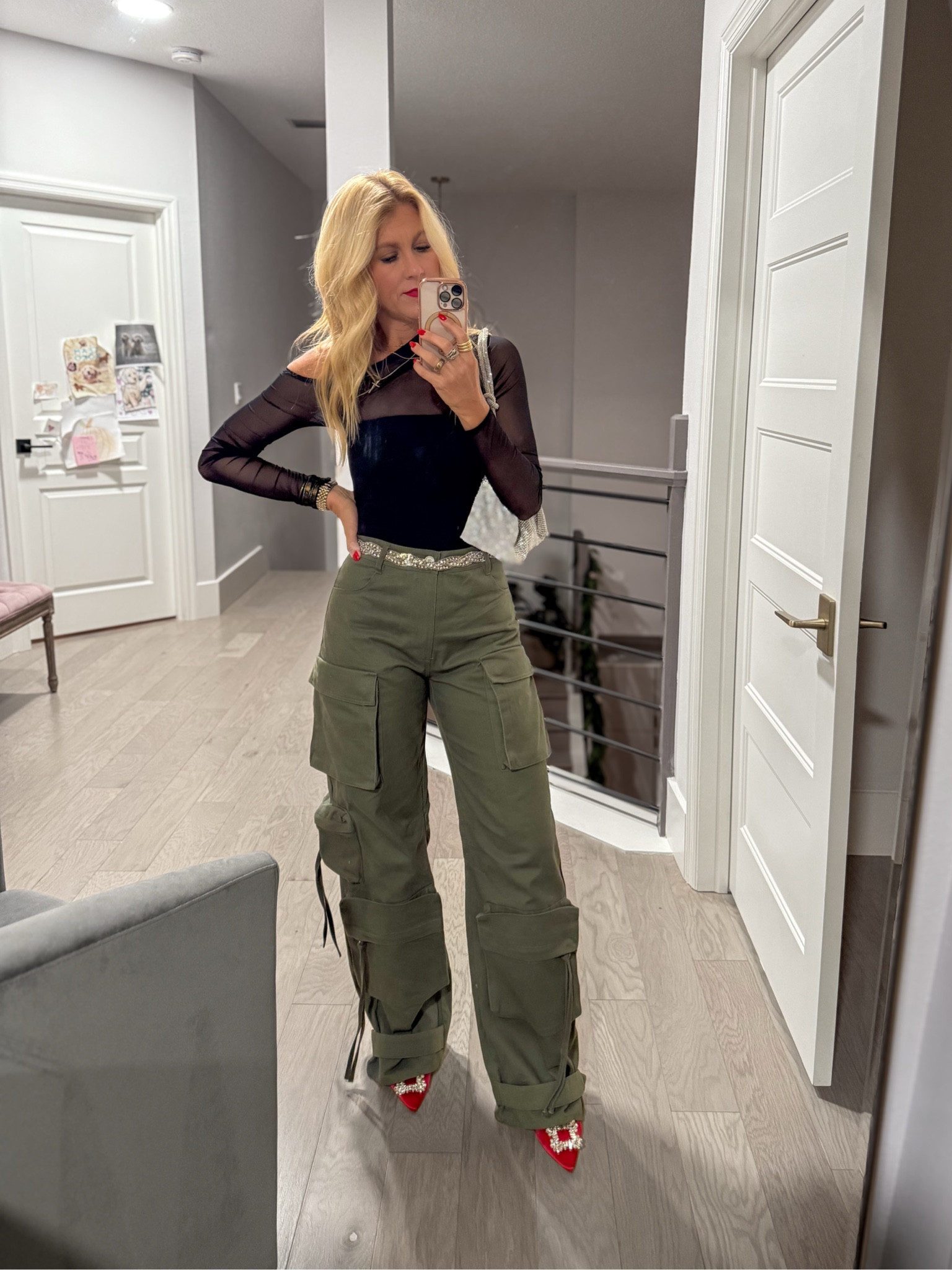 Dressy casual holiday look. Green cargo pants (wearing an XS), black bodysuit. Grab these heels for under $25 with same day delivery on time for Christmas! Got so many compliments on them! 

#LTKParties #LTKShoeCrush #LTKHoliday