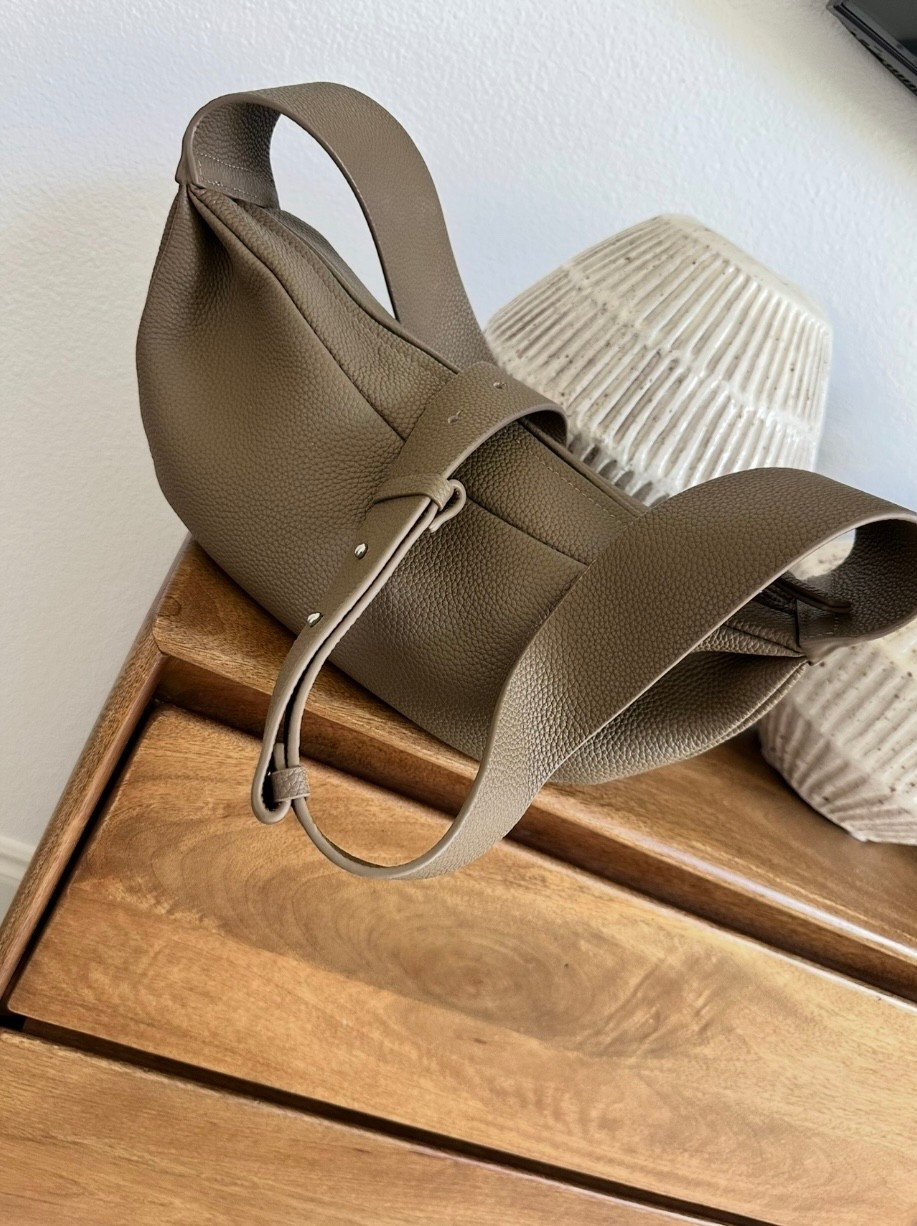 My favorite sling crossbody on sale! This is a good one - all leather, lightweight great quality. One of my all time favorite Amazon finds ever! This is “elephant grey”.

#LTKSaleAlert