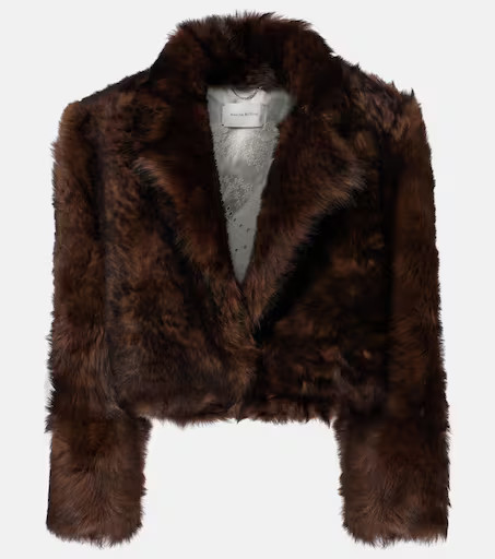 Use code FIRST10 when you spend over £450 | Mytheresa (UK)