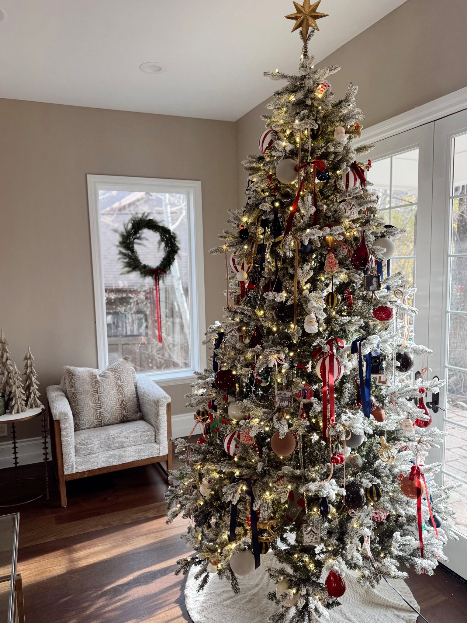  formula for a kids' Christmas tree you
won't want to hide in the back room
When kids' ornaments are naturally multicolored and busy, the trick is to choose just two main hues to anchor the whole look.
For this tree, we went with red + blue-bold, classic, and perfect for letting the handmade pieces shine without competing.
From there, layer in ornaments that bring shape + texture. For a kid's tree I like to pick ornaments that look a little vintage or
"kidish". Think: long icicles for length, striped red and white glass ornaments for shine, golden toy horses to keep it playful and beaded trees to keep it looking "homemade". The mix keeps the tree feeling intentional instead of chaotic.
My rule of thumb?
• One ornament per foot of tree.
So an 8' tree needs eight of each ornament at least to feel full and balanced.
To make it sentimental and elevated, I always sprinkle in a few black-and-white photo frames of the kids. It pulls the whole story together and feels so chic.
And for a true kids' tree, I skip the heavy pine picks and keep it playful. This tree just got a simple jingle-bell garland for a pop of color and texture—
and a classic, simple star on top to finish it off.
A kids' tree... but make it curated, magical, and totally display-worthy. Fr #dehartdesigns #kidstree #christmasdecor

#LTKmomlife #LTKHoliday