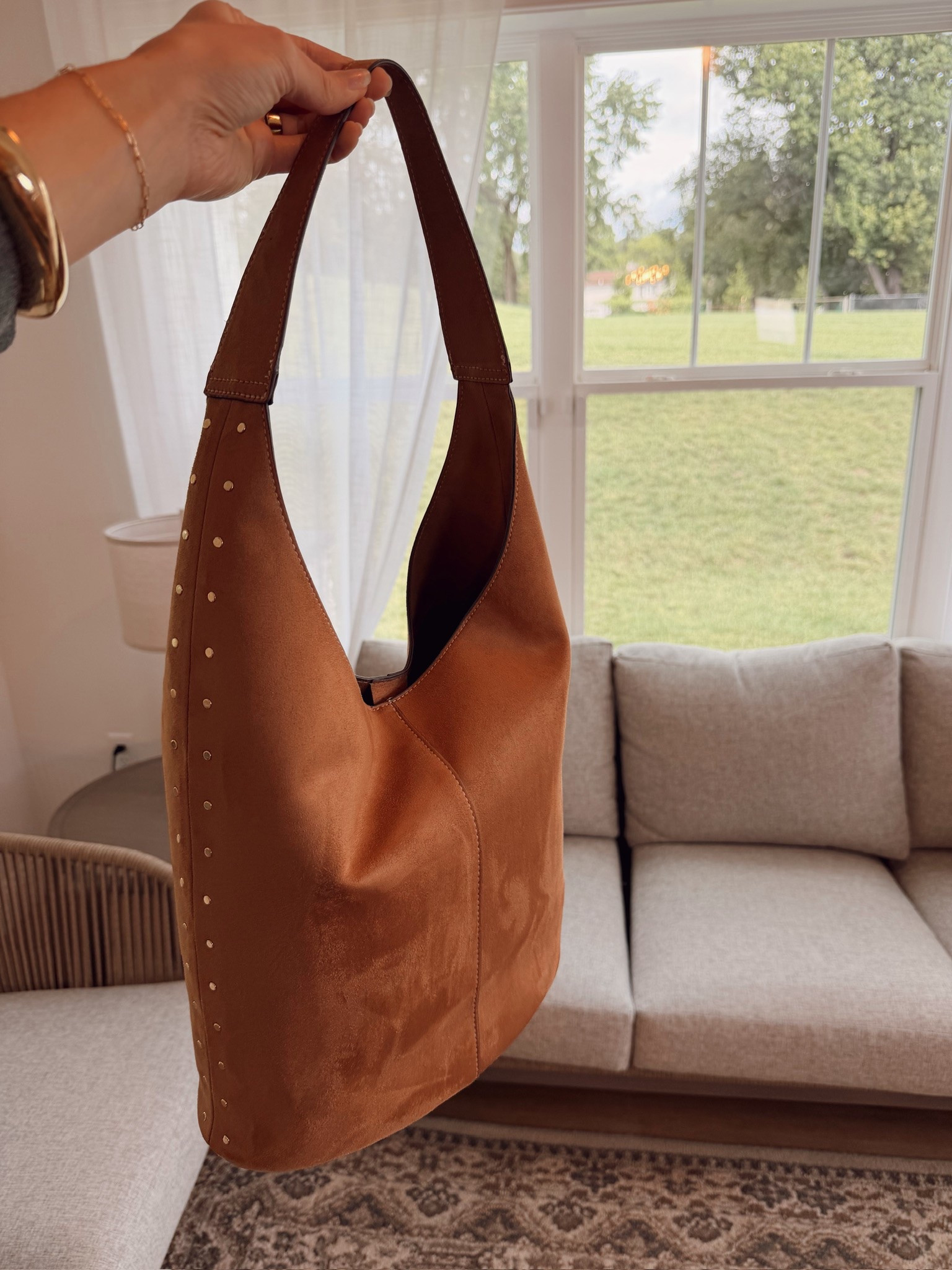 @Walmart Found this tan suede hobo bag at Walmart and it's such a good fall accessory 🍂 Loving the gold stud detail, roomy enough for everyday!

#LTKSeasonal #LTKTravel #LTKNYFW
