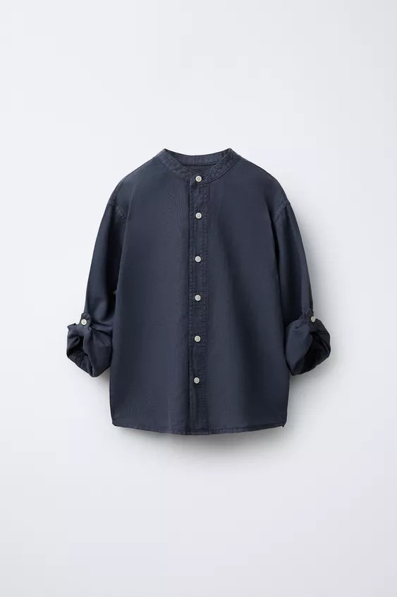 Shirt with a stand collar and long sleeves with button-adjustable cuffs. Button-up front. Fabric ... | Zara UK