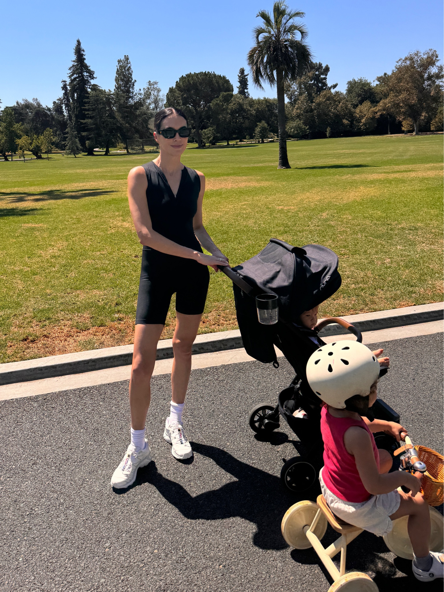 Love this one piece. I’m 5’10 and wearing a size small. The sneakers fit true to size. these are our favorite things to take to the park. Poppy goes between her bike and her scooter. I love that she's excited to get outside and ride around either way. Getting outside daily in the sunlight with my kids is a huge priority for me. This stroller folds up great and is super compact for daily walks where I don't need a ton of storage.

#LTKBaby #LTKFitness #LTKKids