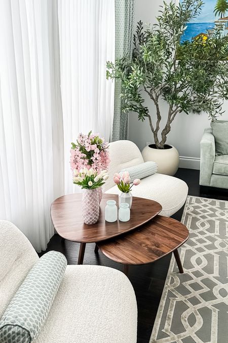 Gave my living room a fresh look for Spring/Summer with new swivel chairs, walnut nesting tables and a new plant! 

#table #coffeetable #sidetable #swivelchair #swivelchairs #spring #summer #homeinterior #olivetree #planter #plant

#LTKhome #LTKSeasonal #LTKstyletip