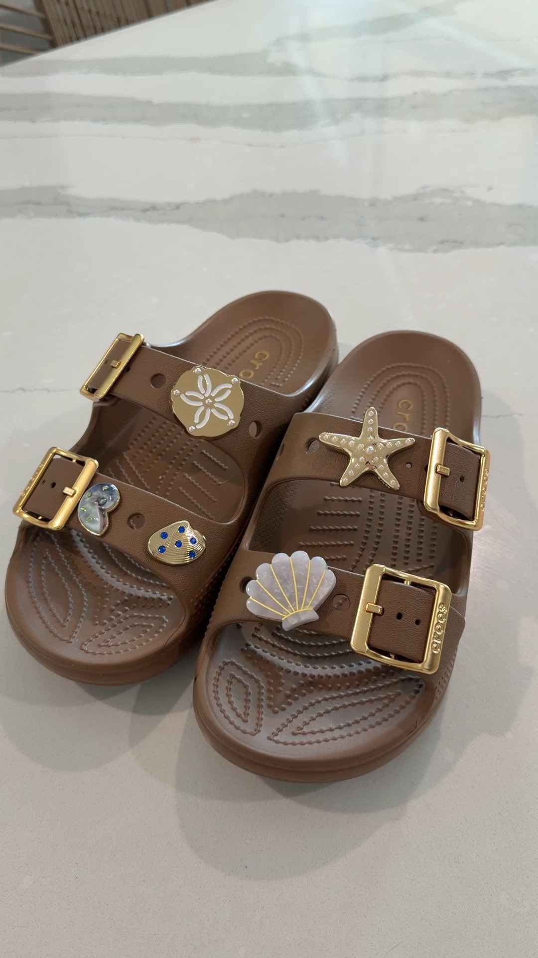 The new gold buckle crocs are so pretty!!! They come in black too and I love the jibbetz! #crocs @crocs #crocssandals

#LTKSwim