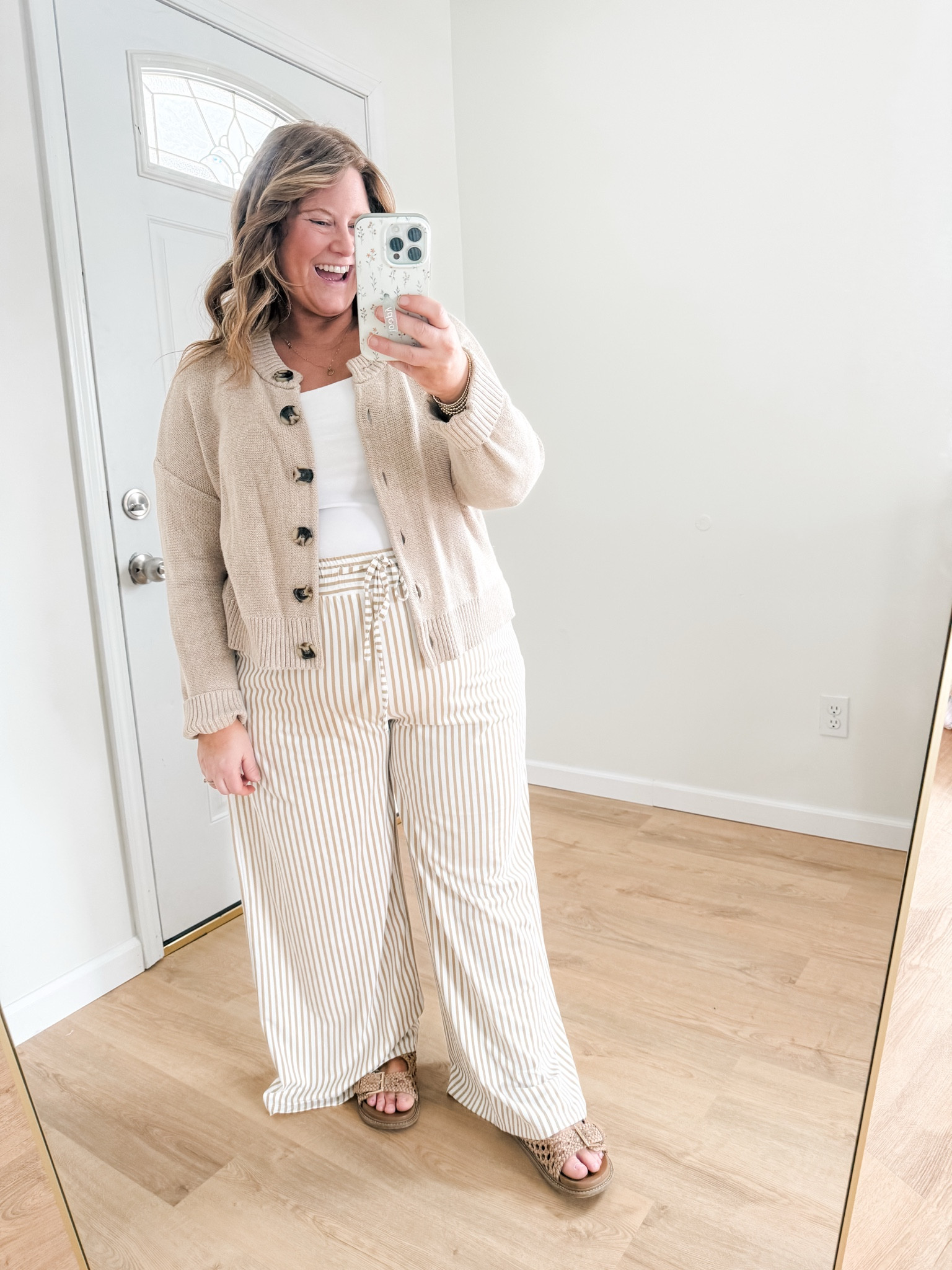 Wearing a large in my cardigan, XL in my tank and an XL in my striped pants  

#LTKMidsize #LTKSeasonal #LTKBump