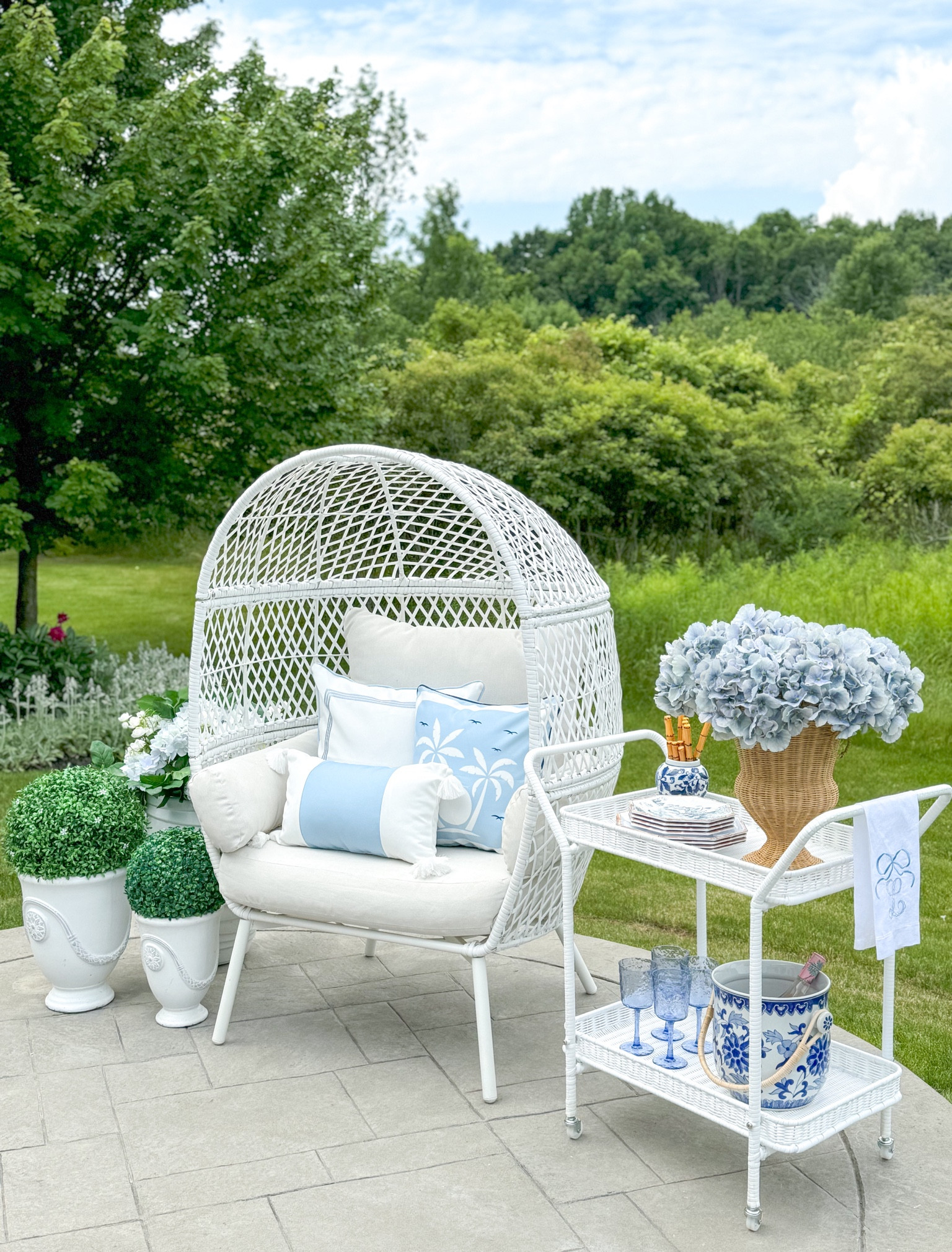 Shop my coastal chic outdoor space!

Outdoor decor, coastal decor, grandmillennial, egg chair, blue hydrangeas, rattan urn, wicker bar cart, white bar cart, monogrammed tea towel, chinoiserie ice bucket, twos company, bamboo flatware, Anduze planter, planter filler, boxwood ball, blue and white decor, outdoor pillow covers

#LTKHome #LTKFindsUnder50 #LTKSeasonal