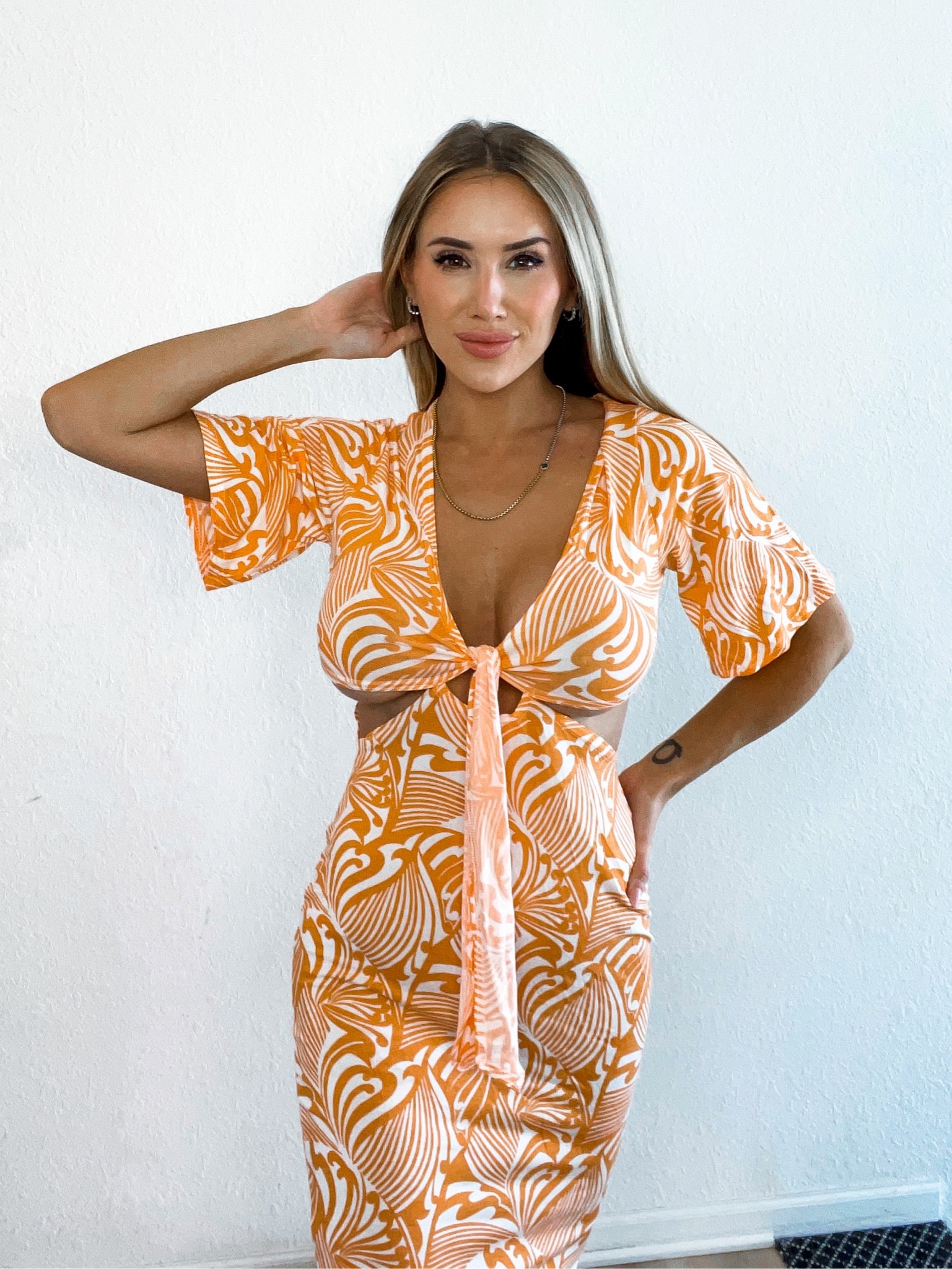 Lightweight tropical Hawaiian vacation resort style maxi dress with front cut out and tie. Orange & White. Wearing a size 4 ltksalealert #competition

#LTKunder50 #LTKstyletip #LTKsalealert