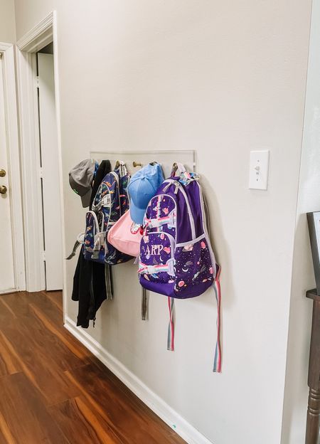 Still working on this mud room area, but way too excited about this wall rack/wall hooks for the kids’ bookbags! Hung it low enough that they can reach everything on their own, which is so helpful during the morning rush to get to school. 

#LTKhome #LTKfamily