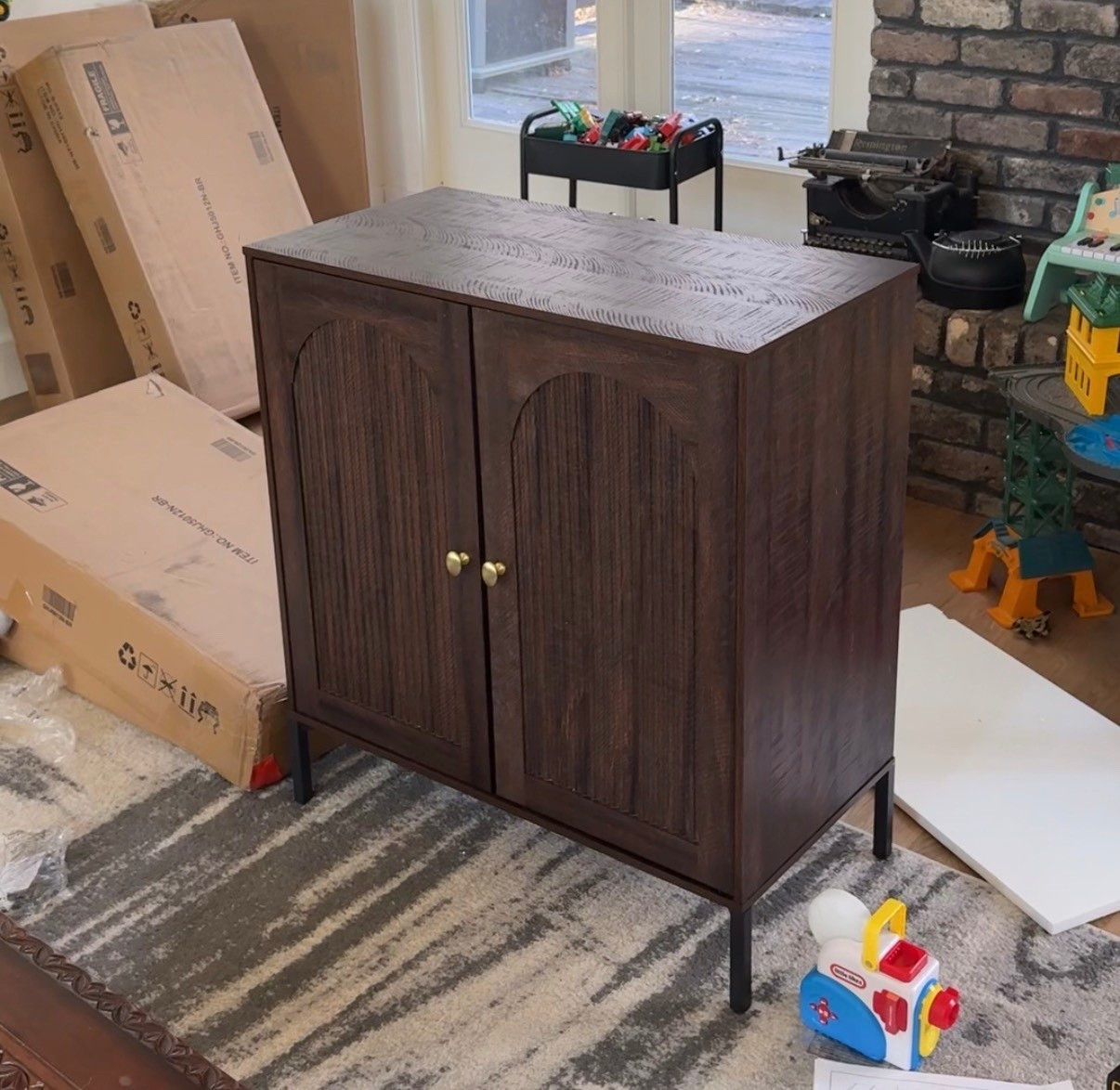 Gorgeous living room cabinet from Amazon. Incredibly easy to build and great quality  

#LTKHome