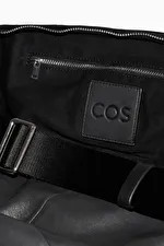 SLING BACKPACK - LEATHER - BLACK - COS | COS (EU)
