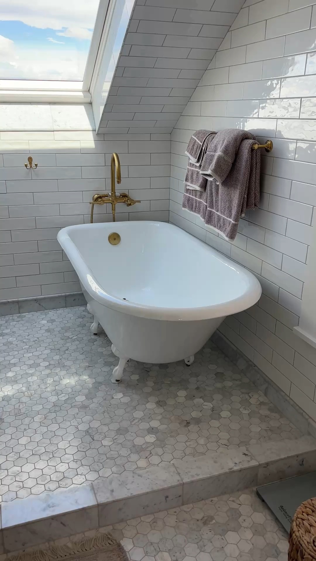 My dream clawfoot tub under the skylight In the Hill House’s ensuite bathroom

#LTKHome