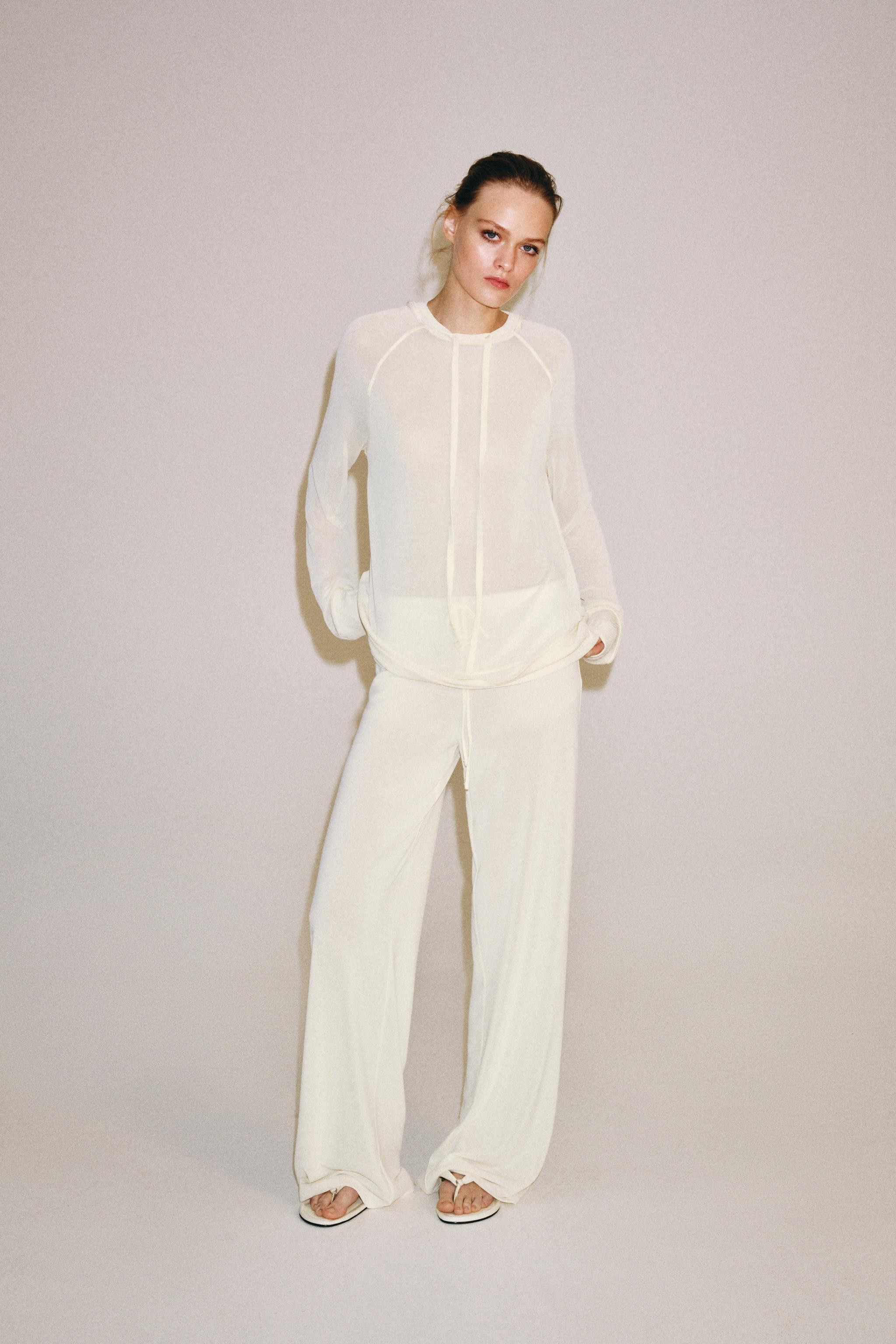 Model height: 176 cmSweatshirt crafted from semi-sheer fabric. Round neck with adjustable drawstr... | Zara UK