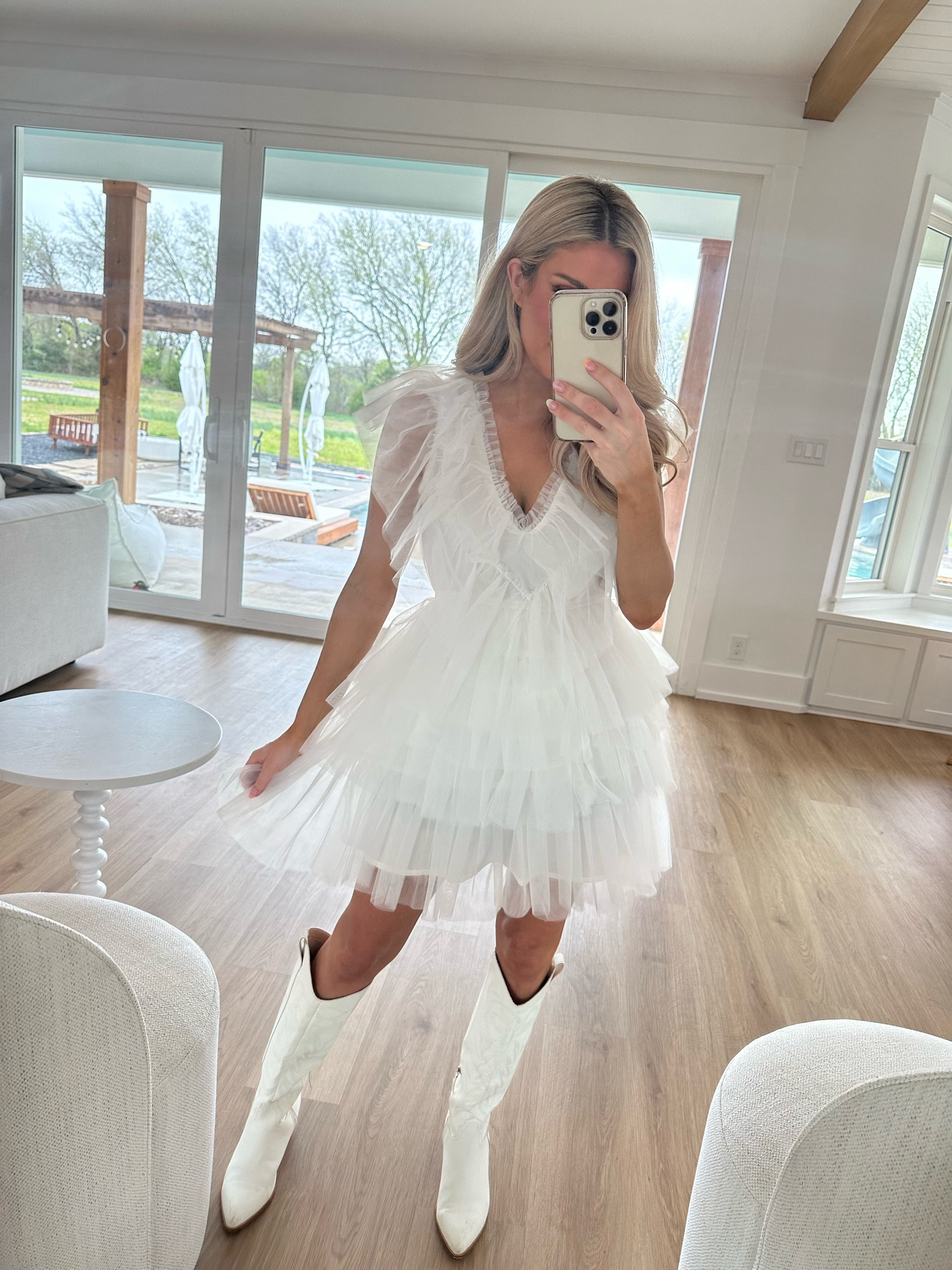 White dress, tulle dress, white cowgirl boots, Nashville outfit, bride look, bride style, bridal style, white tulle dress, bridal shower dress, concert look 

#LTKunder100 #LTKstyletip #LTKSeasonal