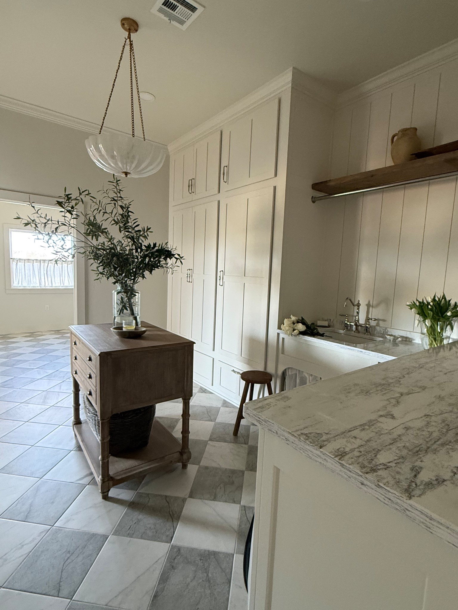 One more angle of the laundry room! The countertops are quartz Astoria and the paint color is shoji white  

#LTKHome